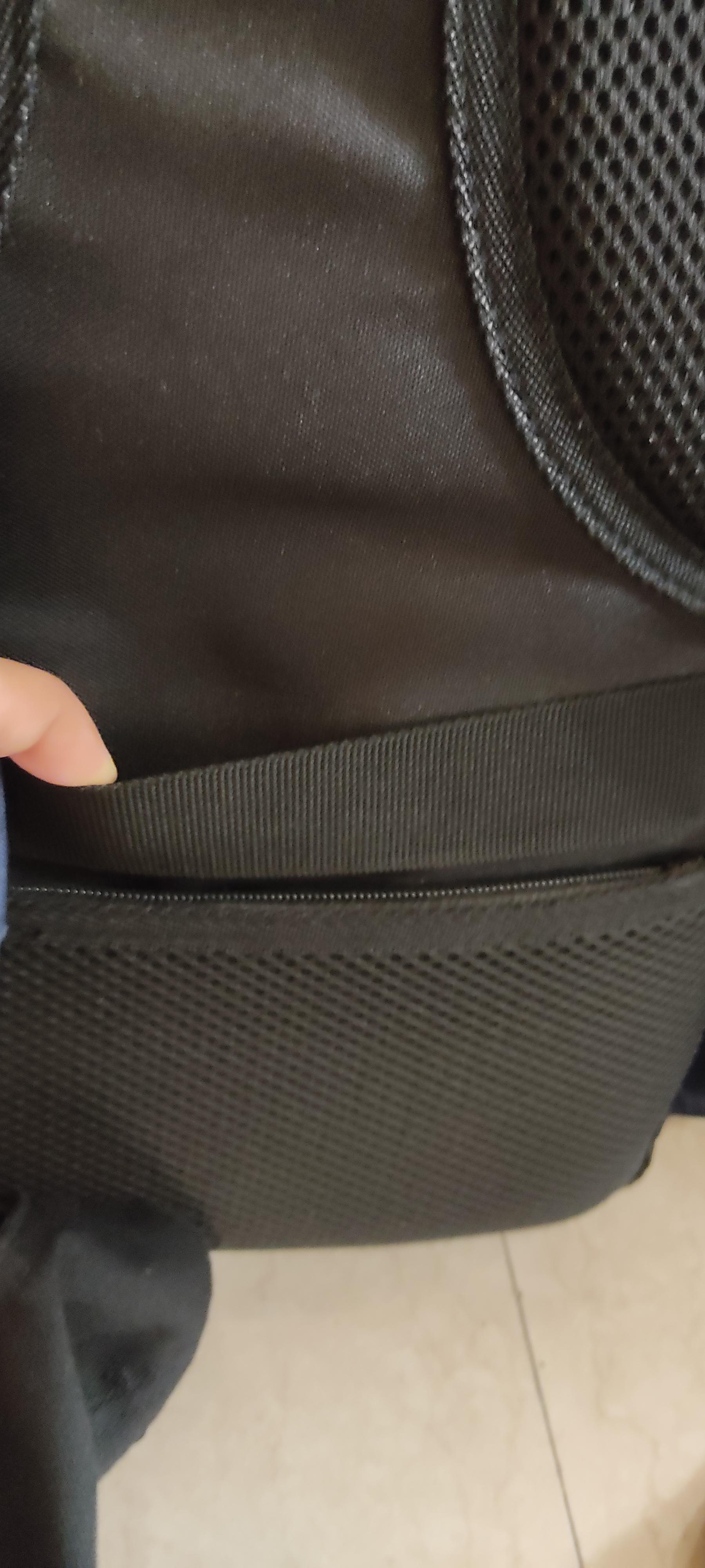 what is this strap behind my backpack? How do I effectively use it? r