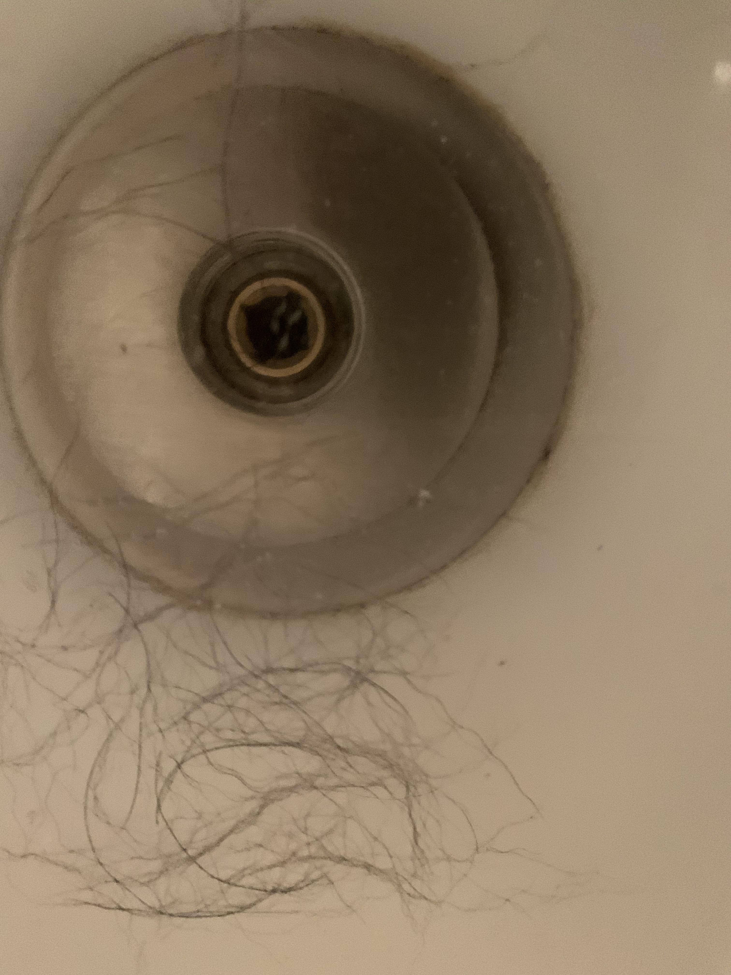 Dog hair has clogged our basement drain with pipes under concrete. What tool do I need to