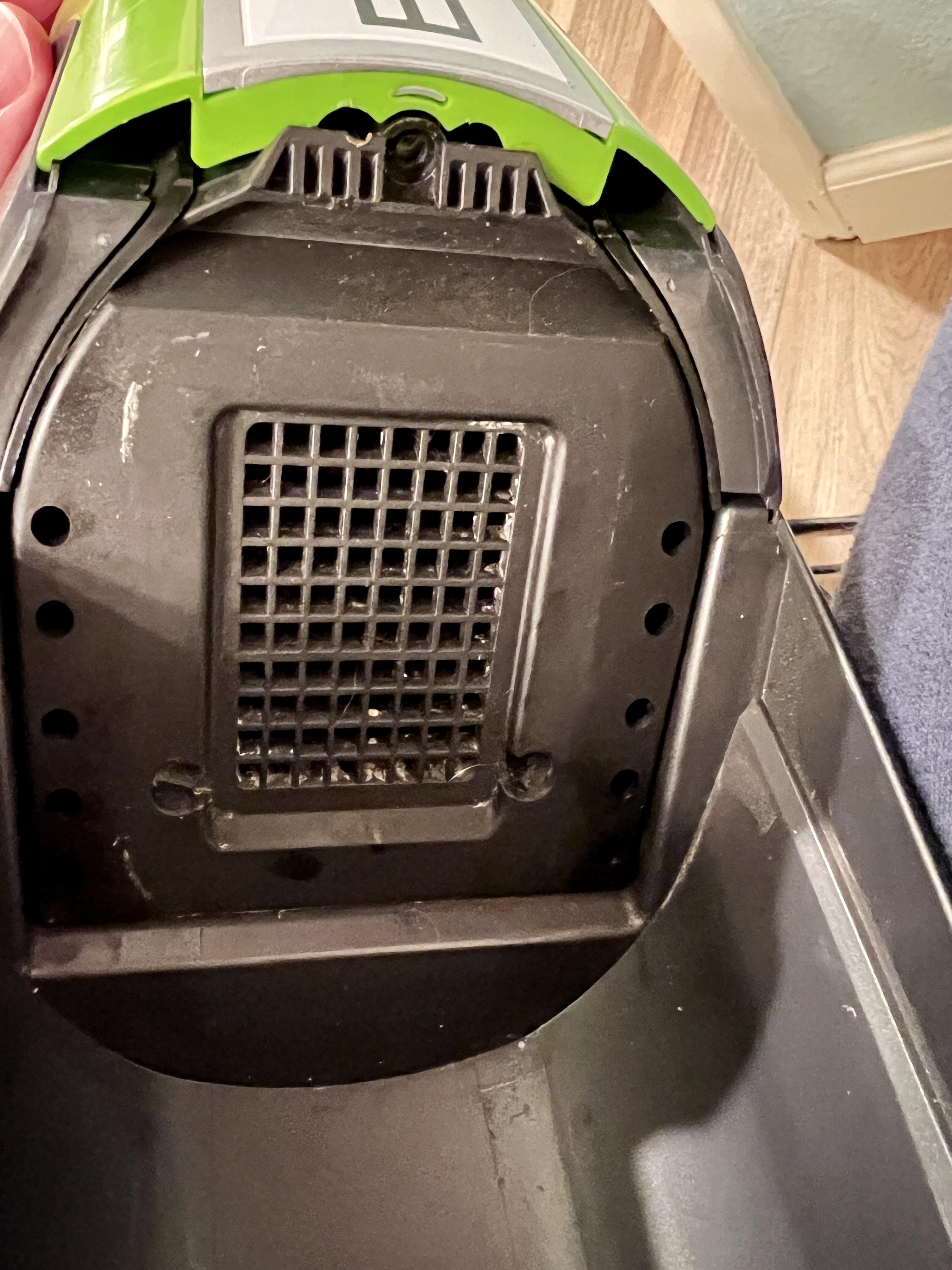 Bissell Crosswave exhaust air smells like mold. How do I get in and