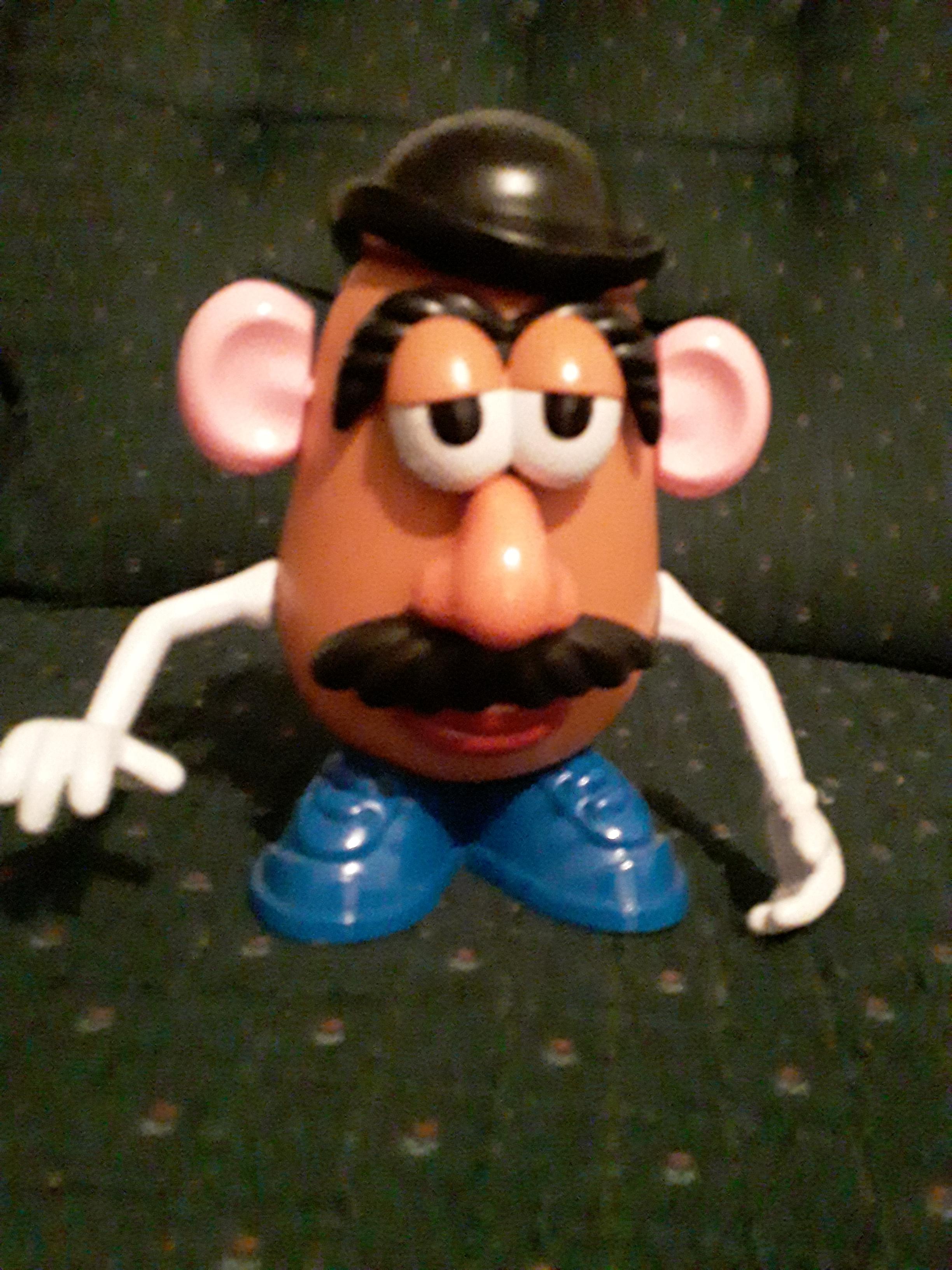 My custom mr. Potato Head using pieces from Toy Story 3 and 4 versions