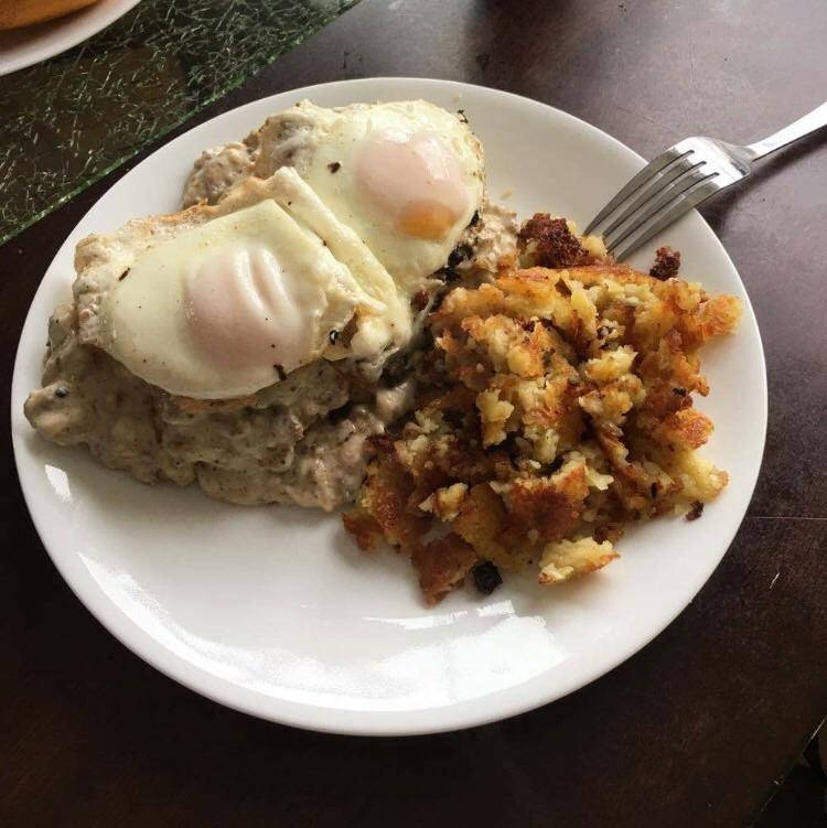 [Homemade] biscuits and gravy with fried eggs and hash browns. r/food