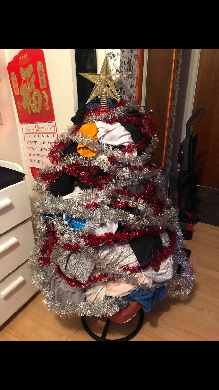 Dirty laundry Christmas tree r/funny