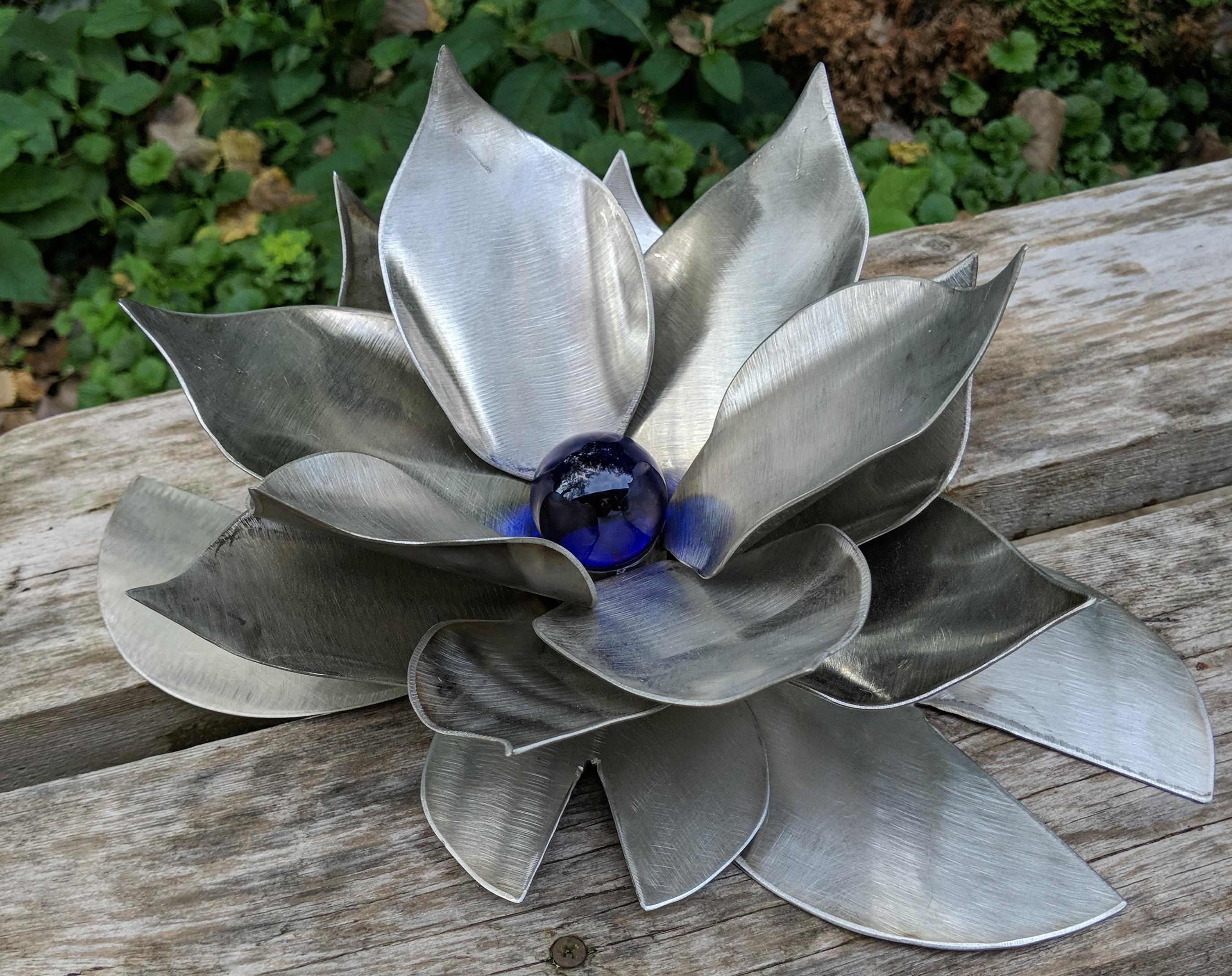 Stainless steel lotus flower I made in my welding class r/somethingimade