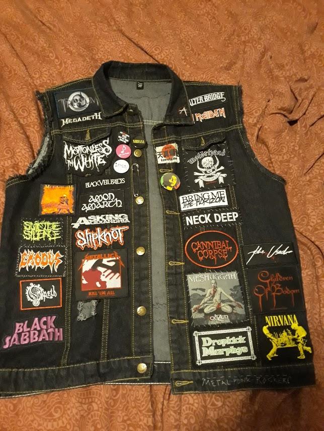 Giving you all a taste of Metal. Here's my battle vest. All patches are
