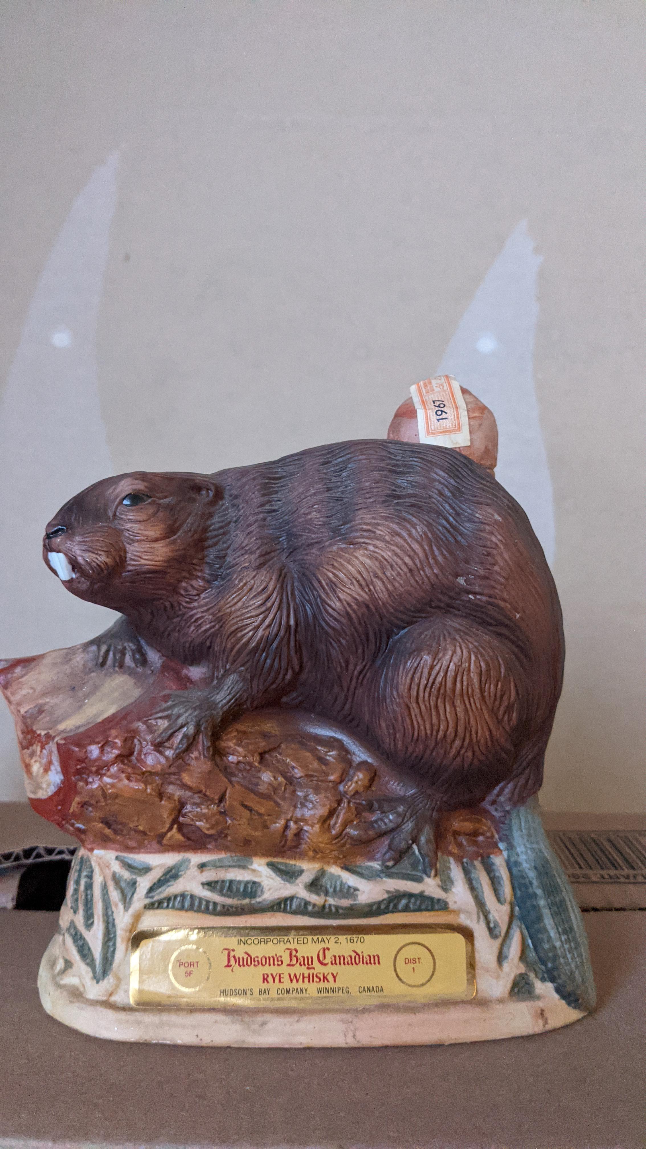 Ceramic beaver shaped whiskey flask. Completely sealed from 1967. Sold