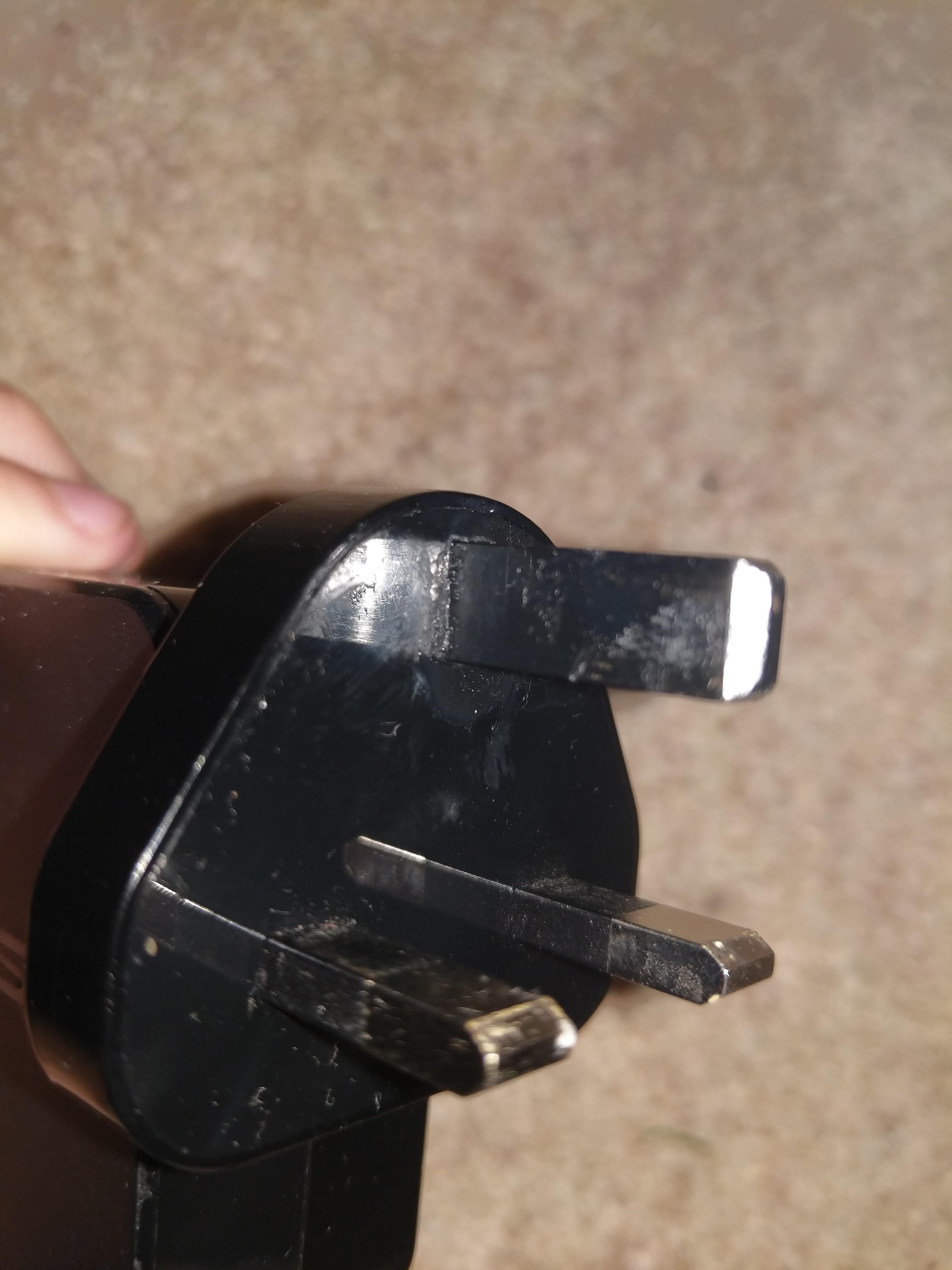 Is this safe? Top pin of laptop charger broke off so I superglued it