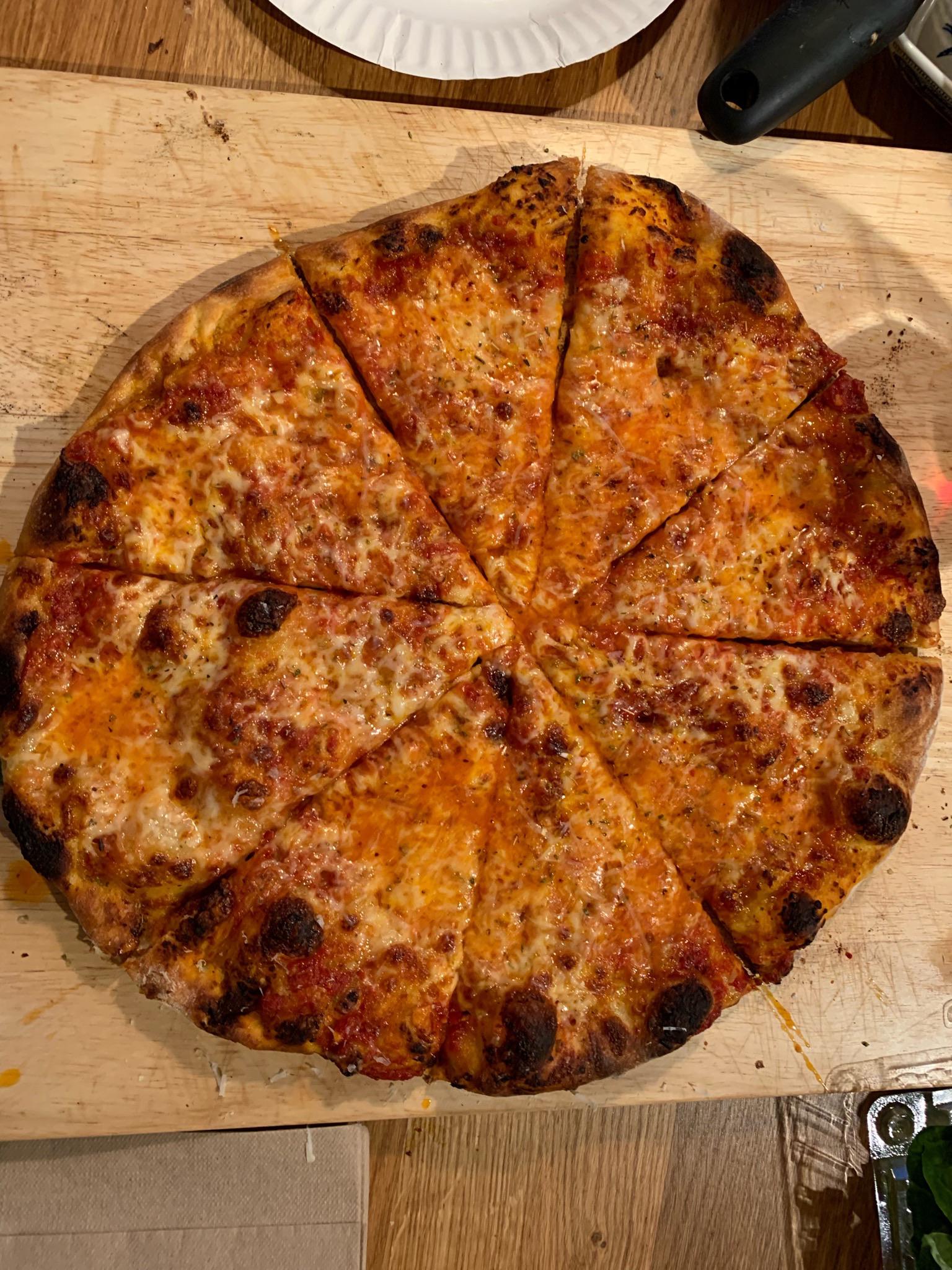 NY style un home oven r/Pizza