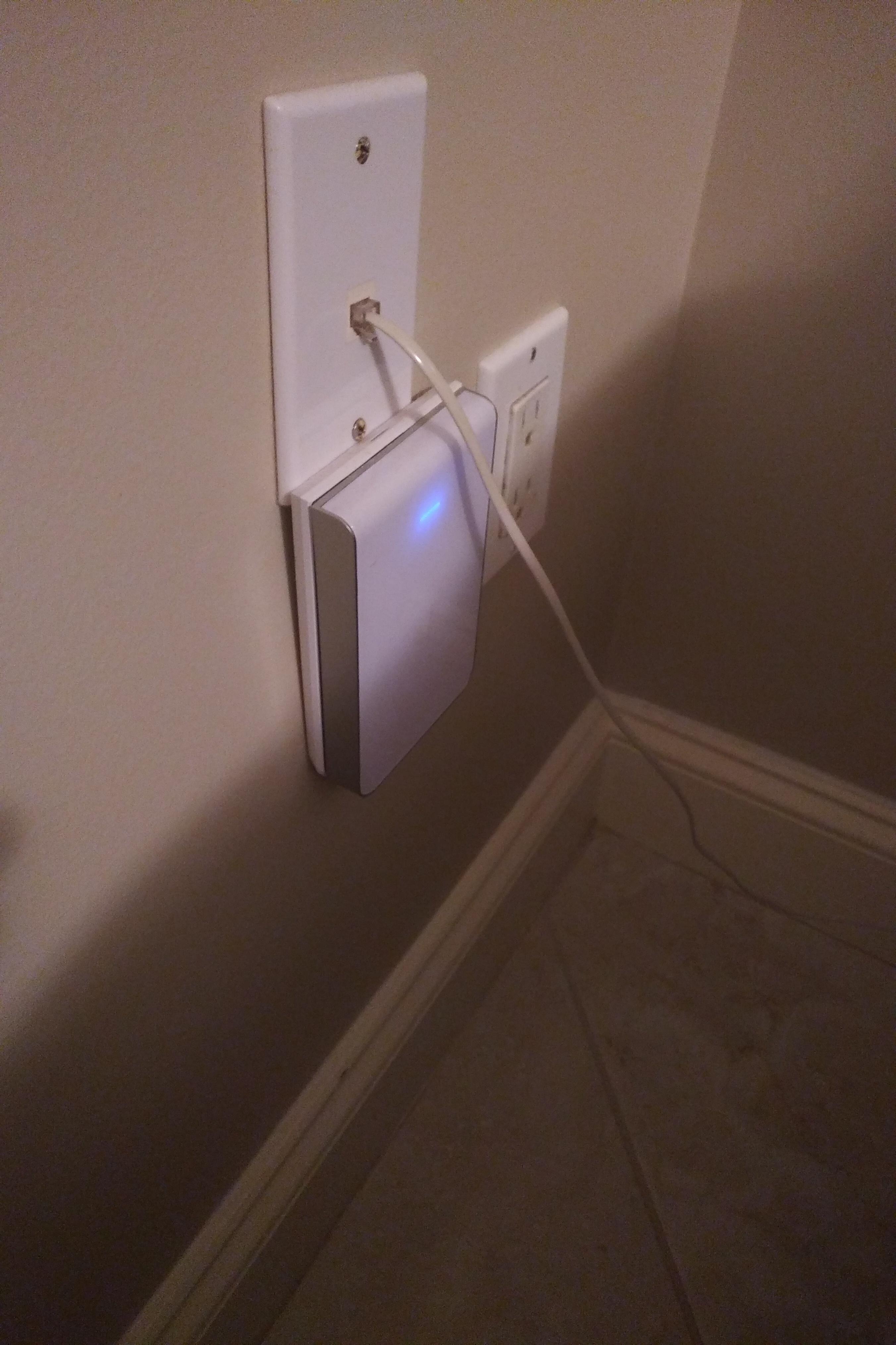 it's mounted to the phone jack outlet and i have no idea what it is : r