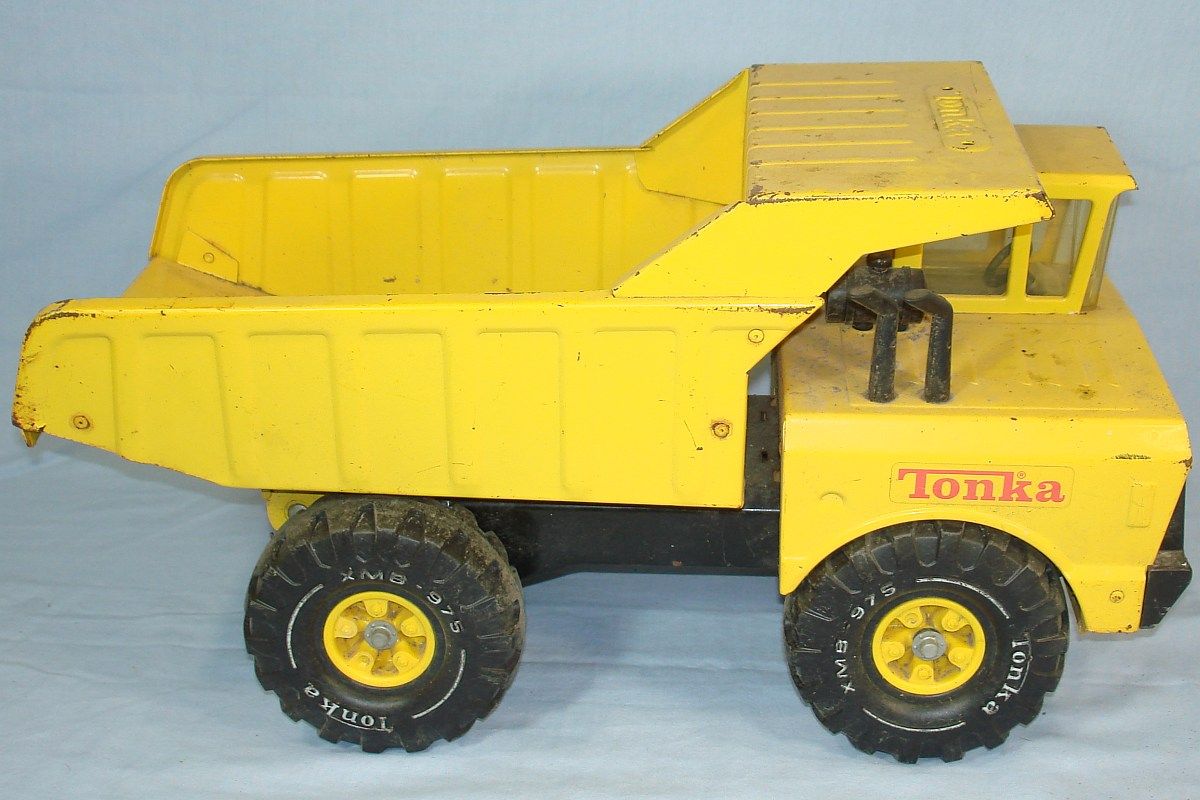 Metal Tonka Trucks before they were made of plastic. No assembly, but a