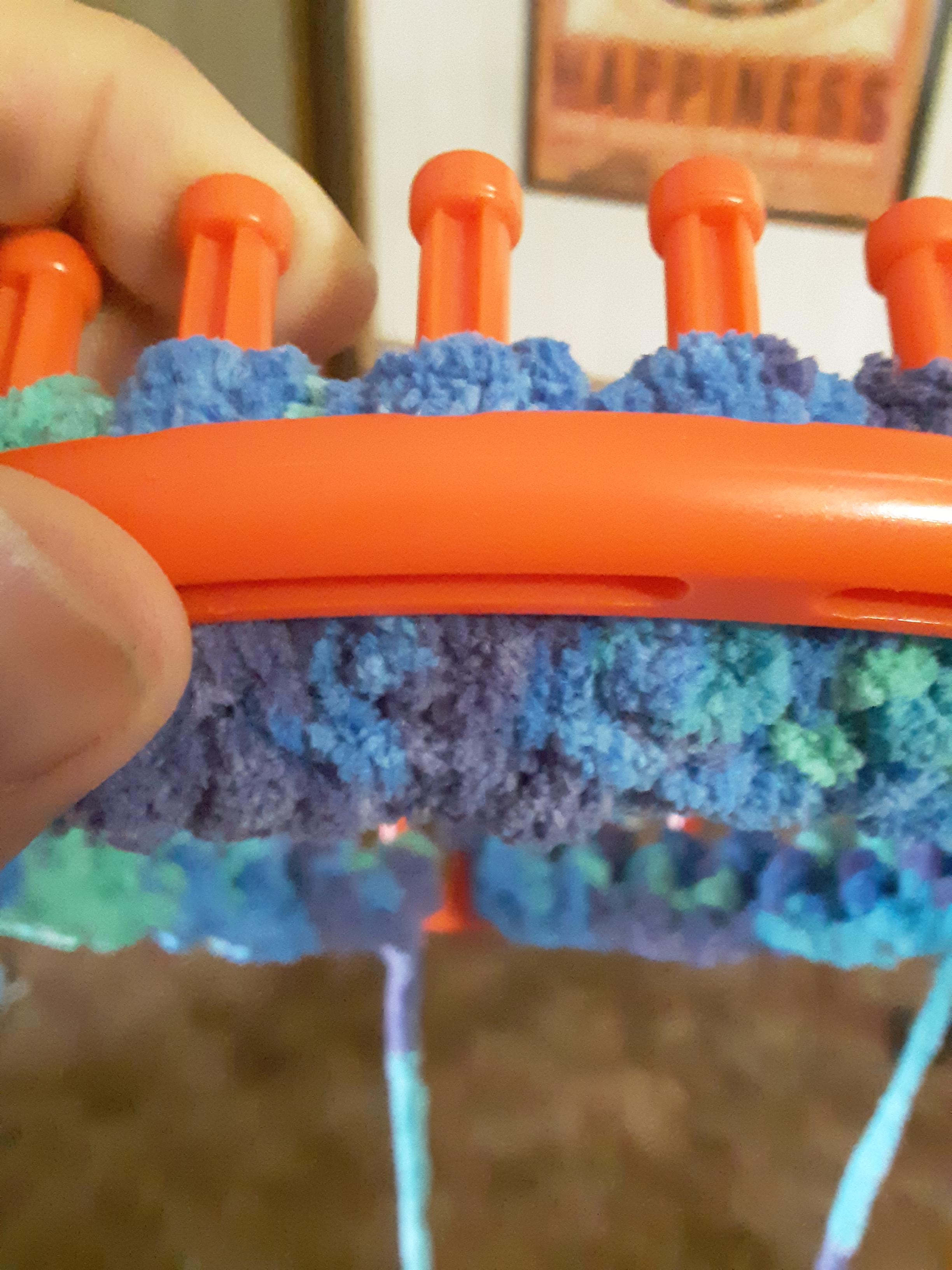 The moment your blanket peeks out the bottom of the loom!! Started last