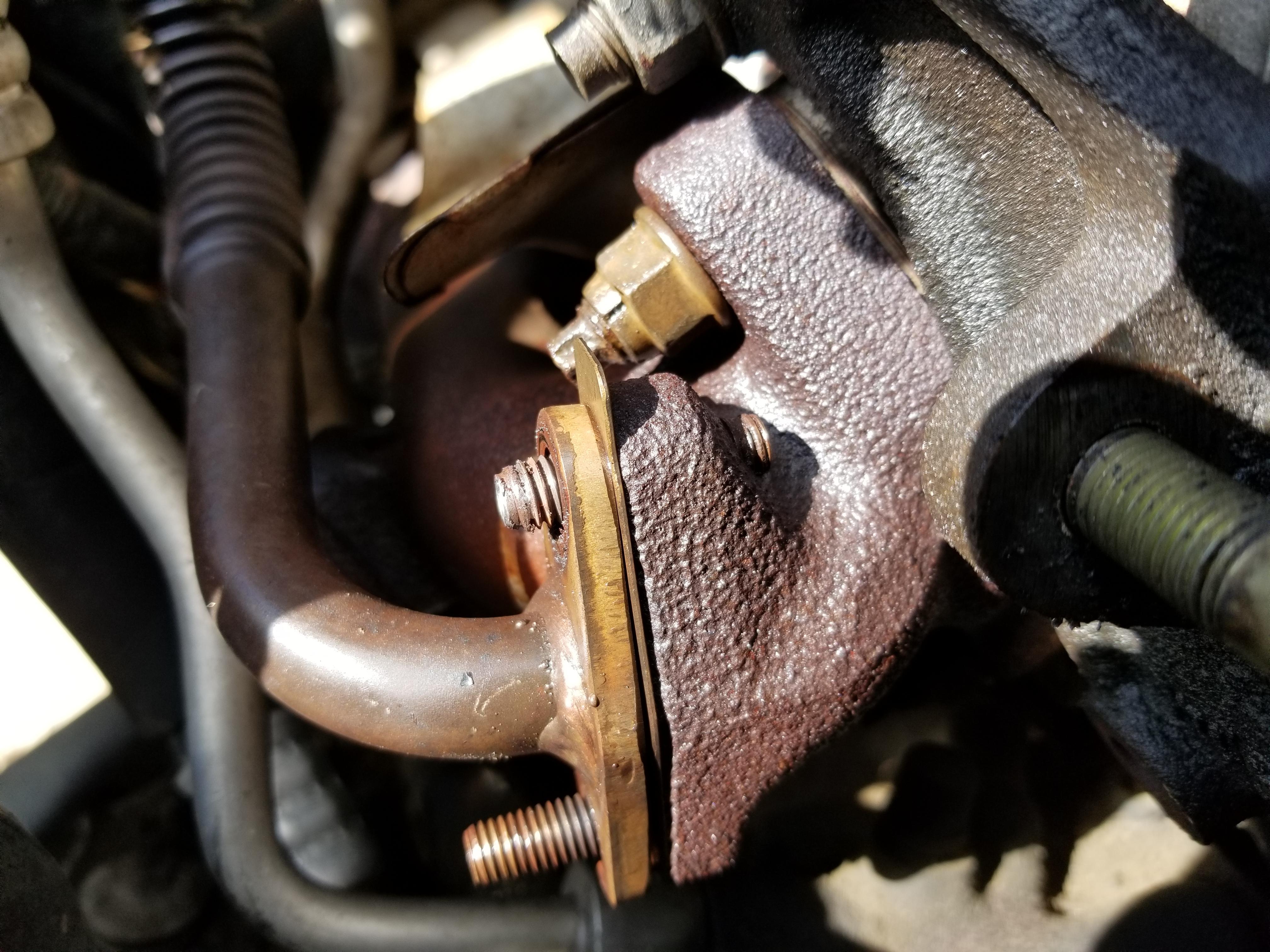 Changing headgaskets. Exhaust manifold looks rusty? Is there anything I