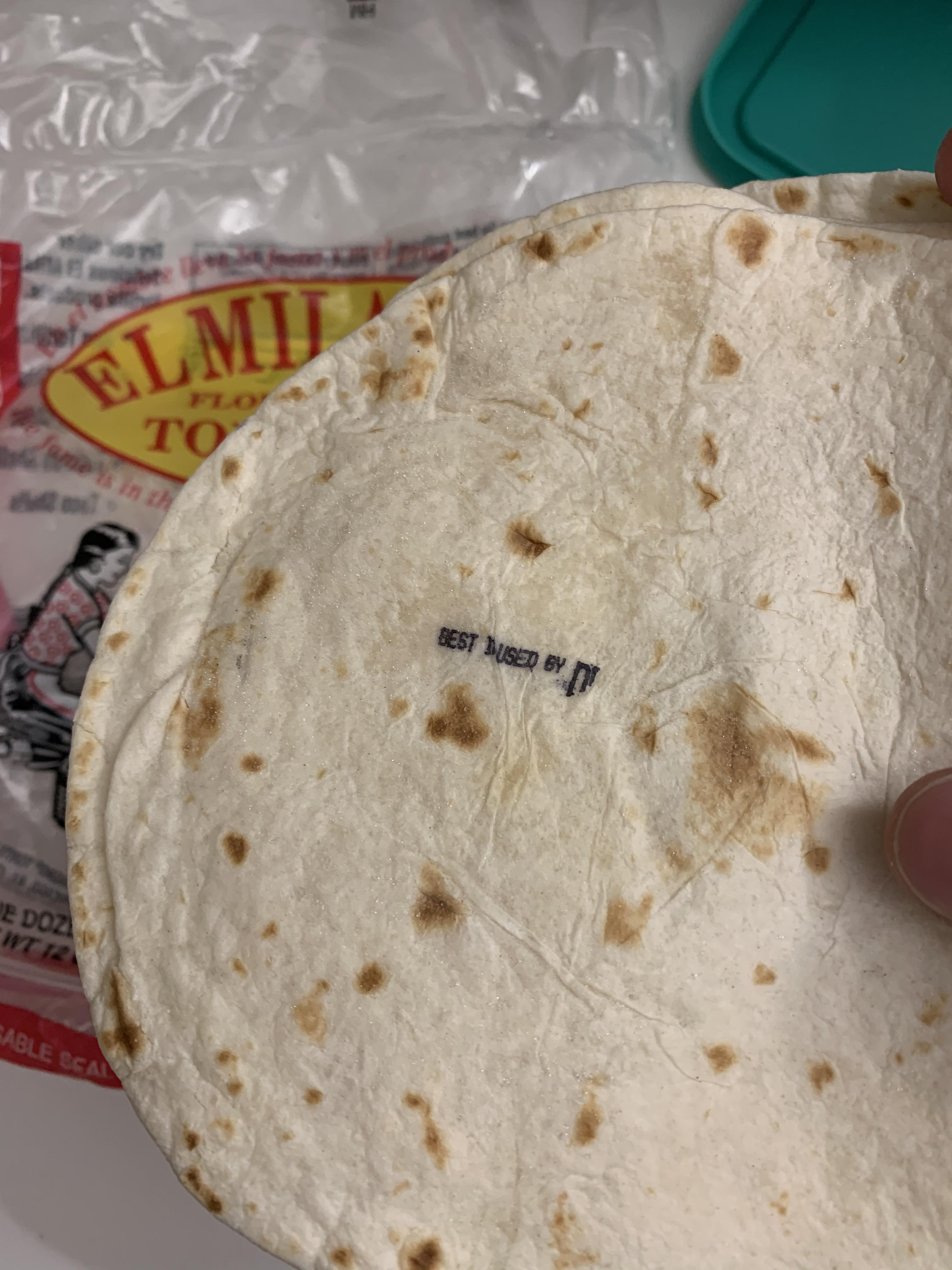The “Best by” date somehow got stamped on the tortilla. r
