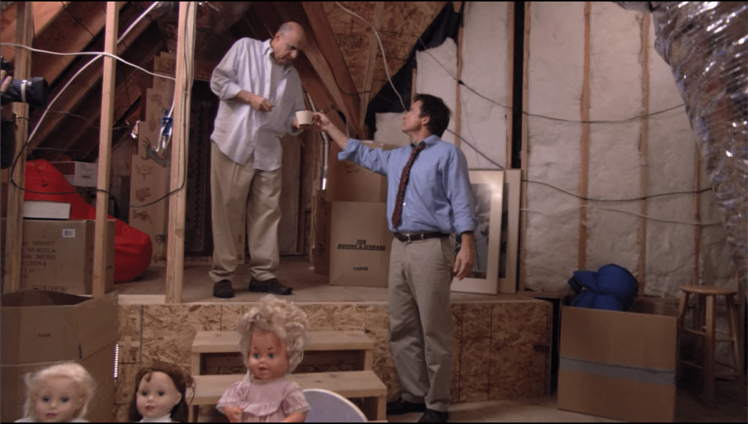 In Arrested Development S2 E13 at 415 one of the cameras is visible on