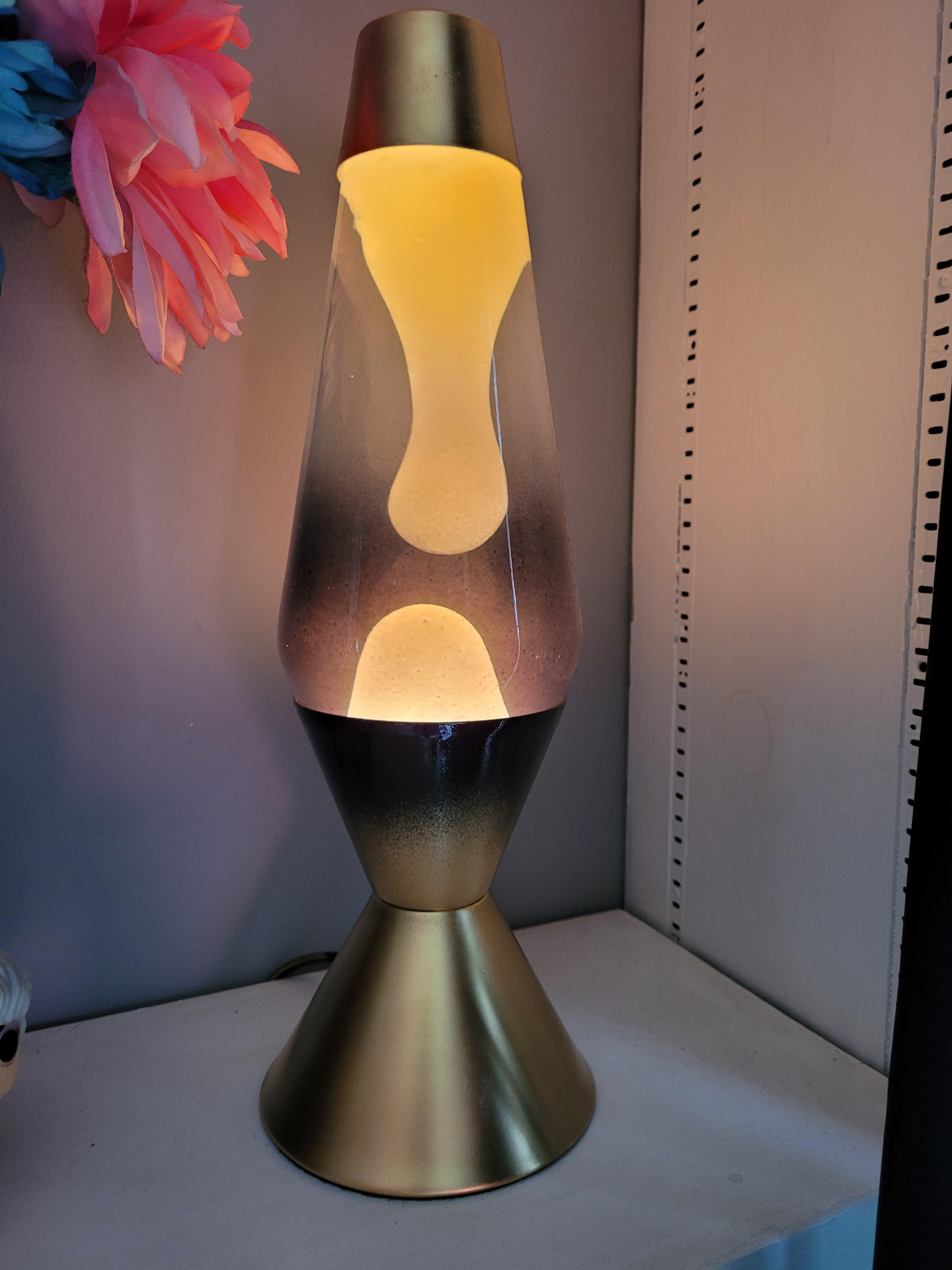 Bought my first Lava Lamp. Teal base and orange wax. Great to fall