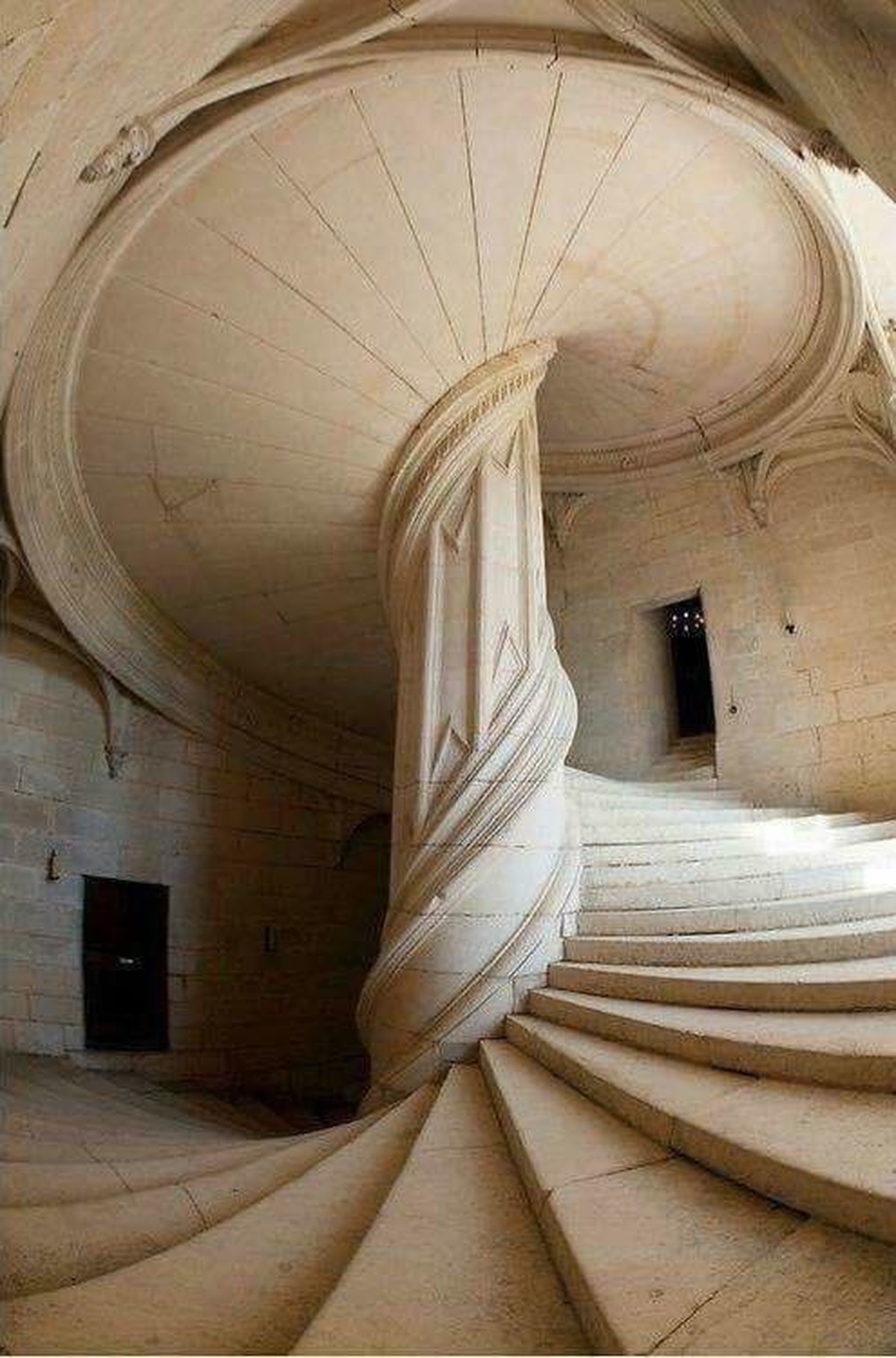 The spiral staircase inside the Château de La Rochefoucauld in France