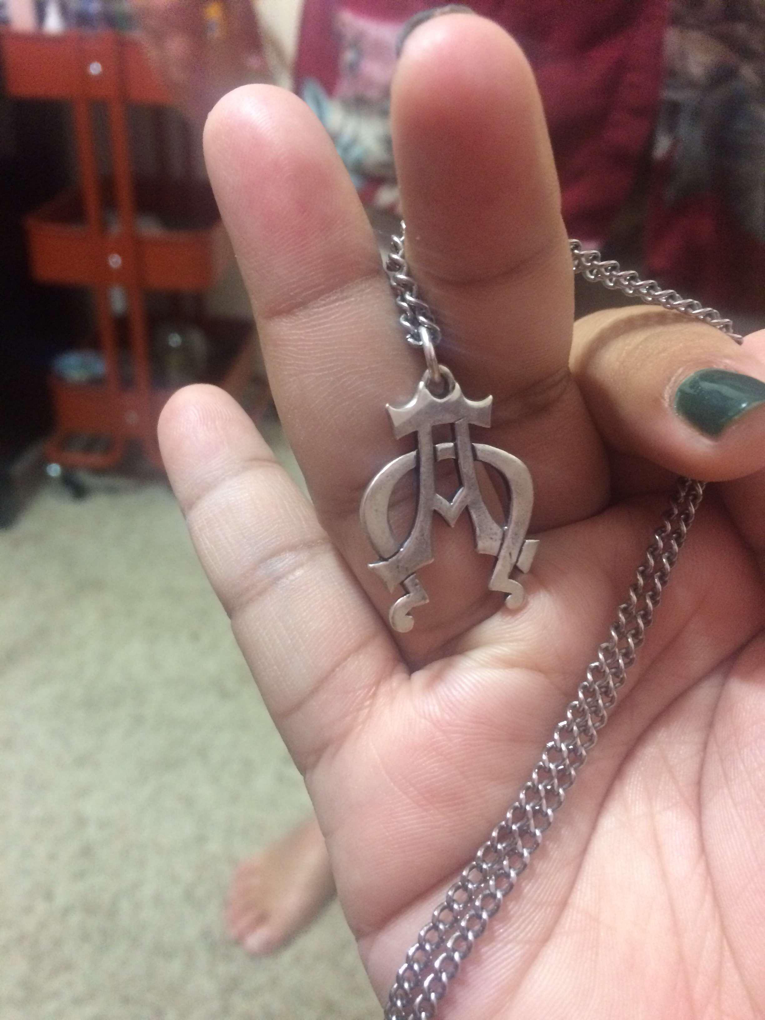 Meaning of this necklace. My friend’s dad shows this necklace to every