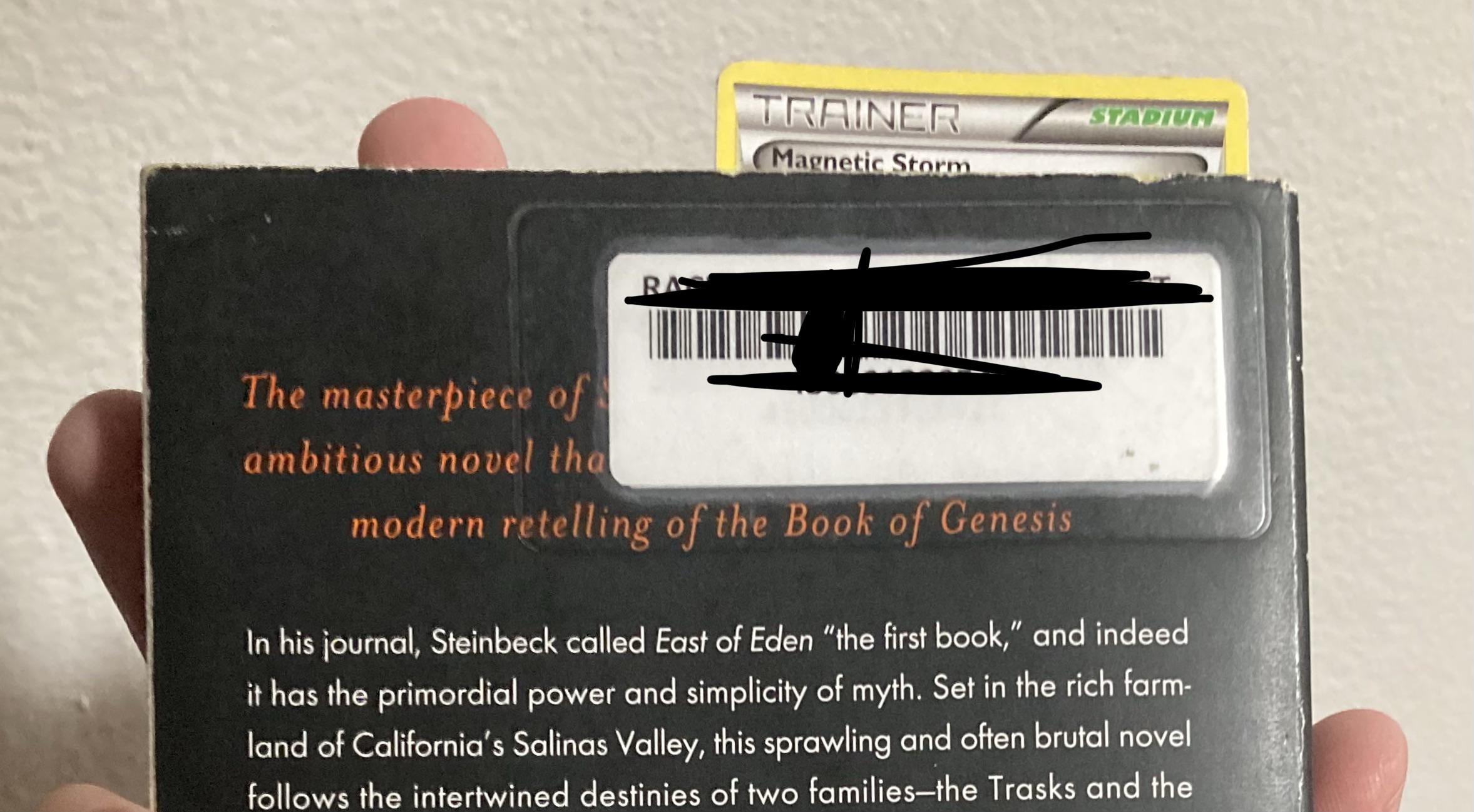 Why do libraries have to put their giant stickers over text? r