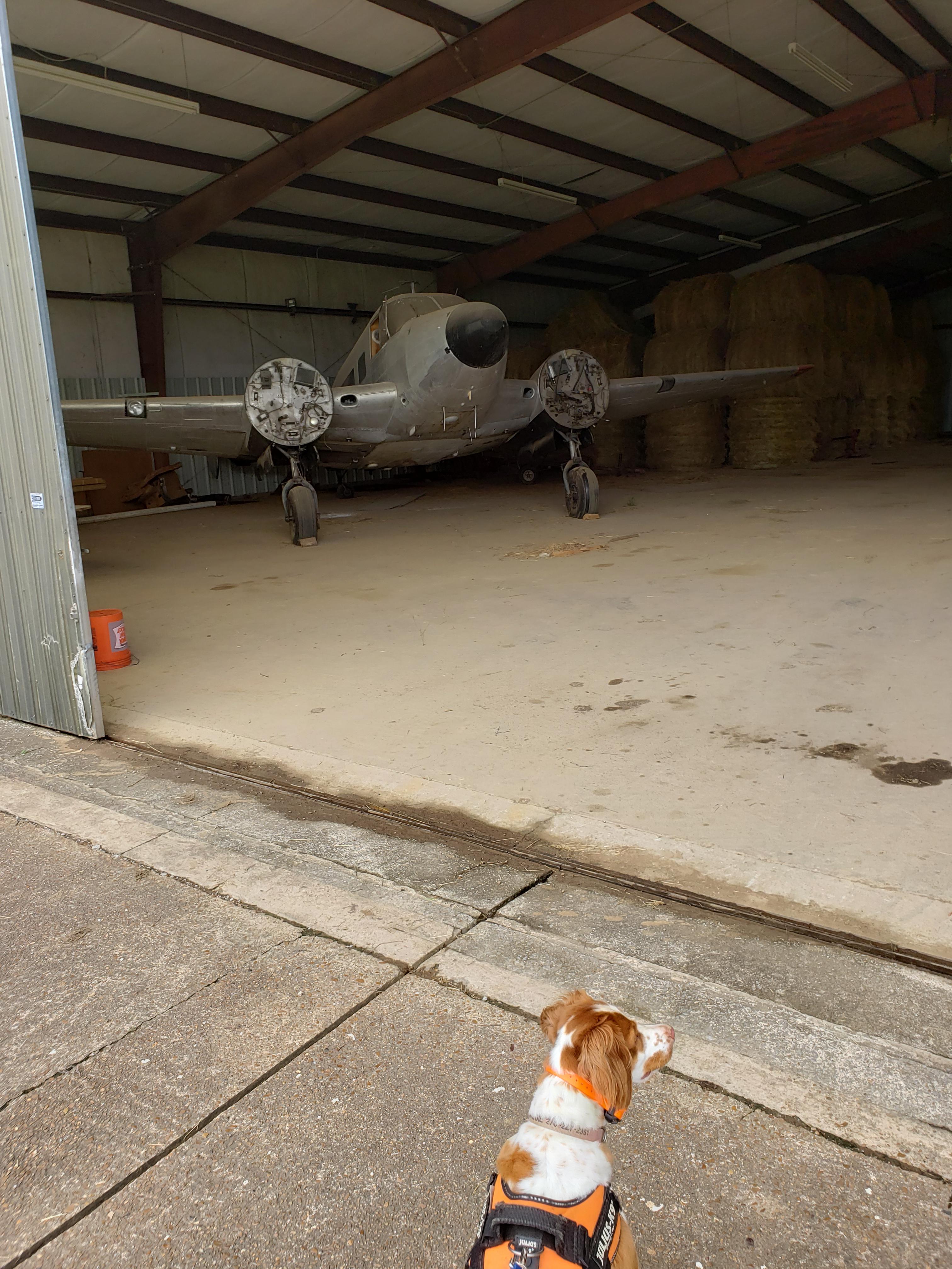 An old Beech 18 sitting in a hanger at the defunct Cornelia Fort