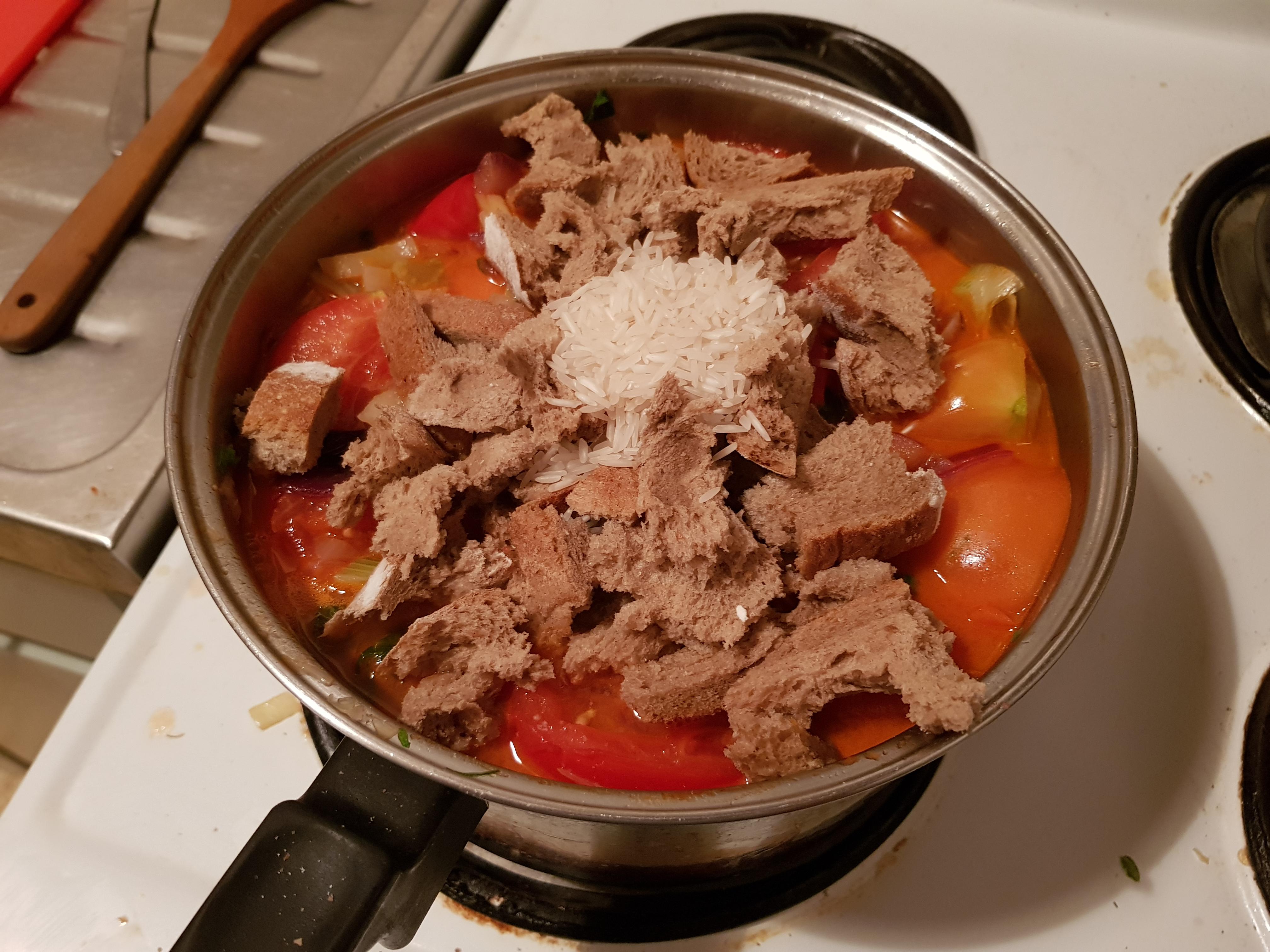 Making some tomato soup, using rice to make it "silky" (according to