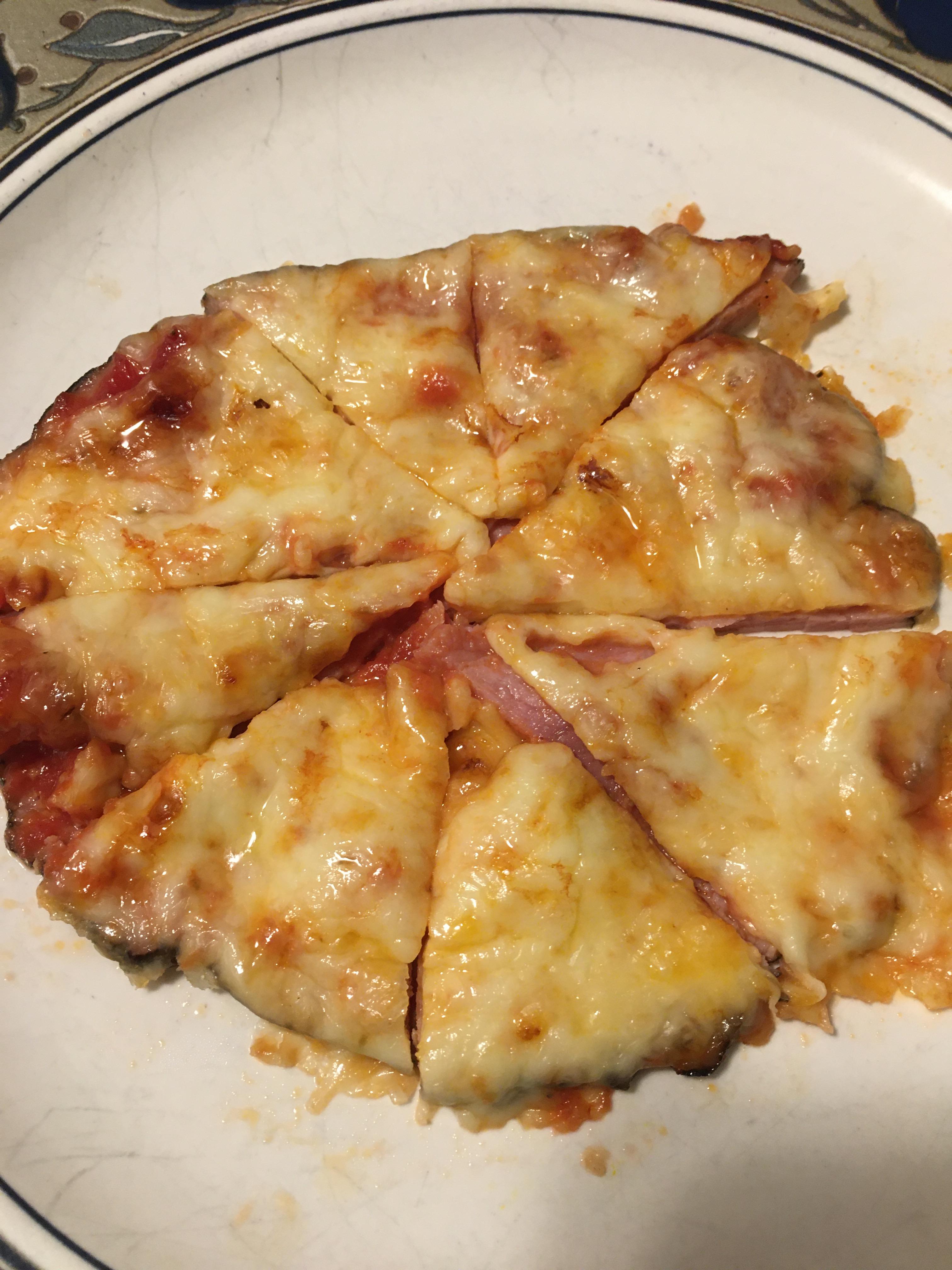 Personal ham pizza. Slab of ham roast with marinara and mozzarella
