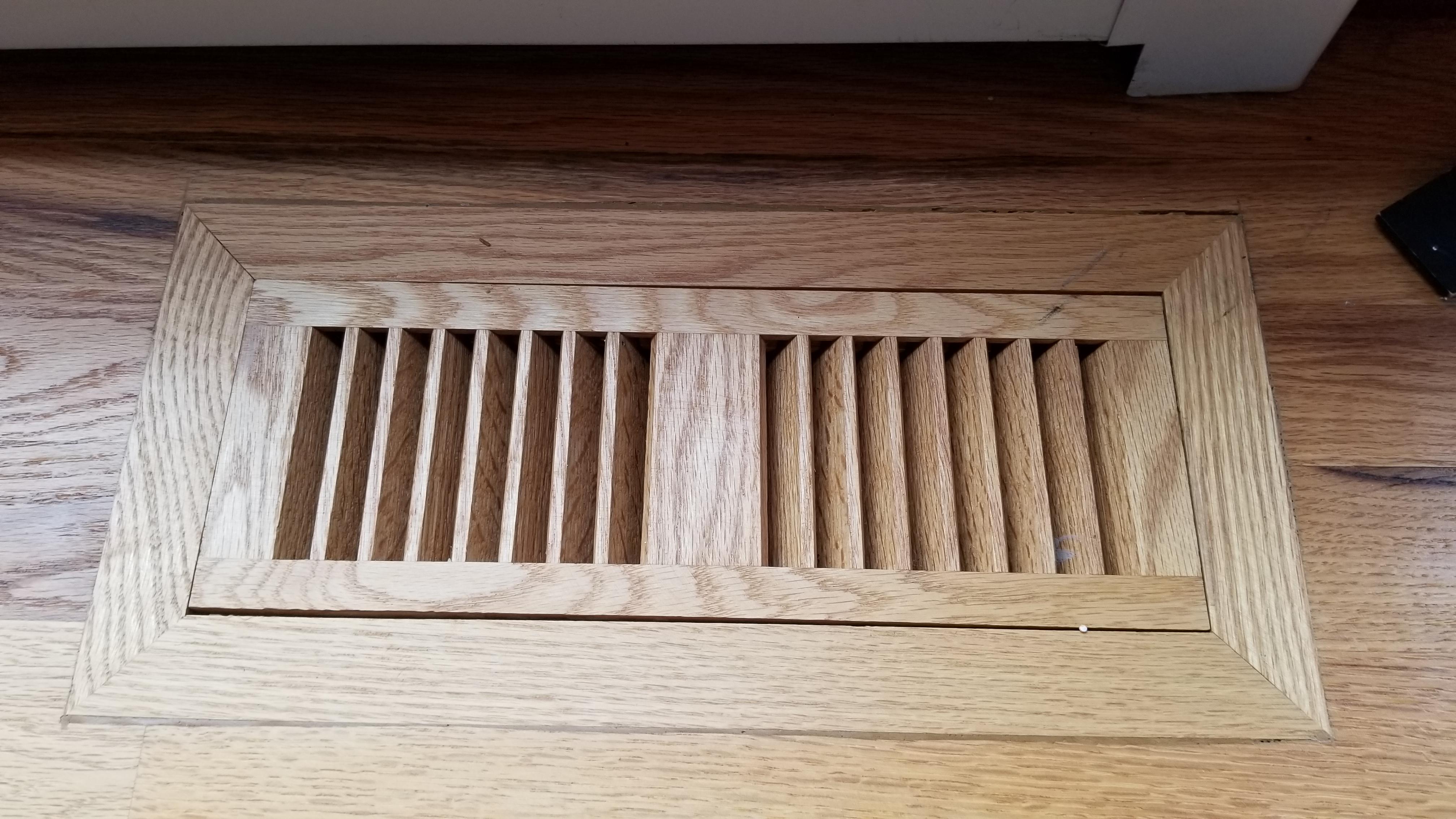 A wooden floor vent instead of a metal vent. r/mildlyinteresting