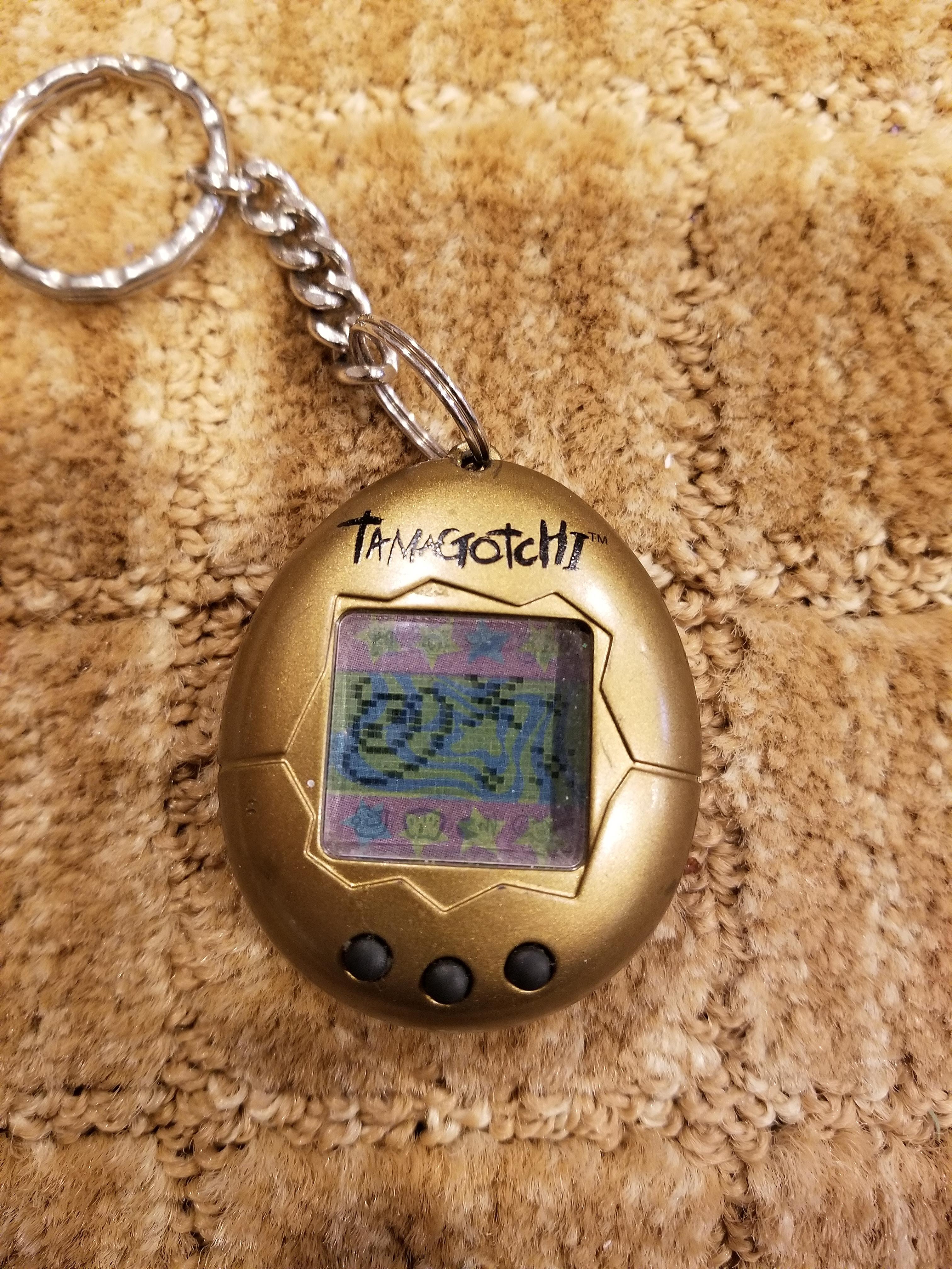 Tamagotchi. The original virtual pet. Here is my gold edition, still