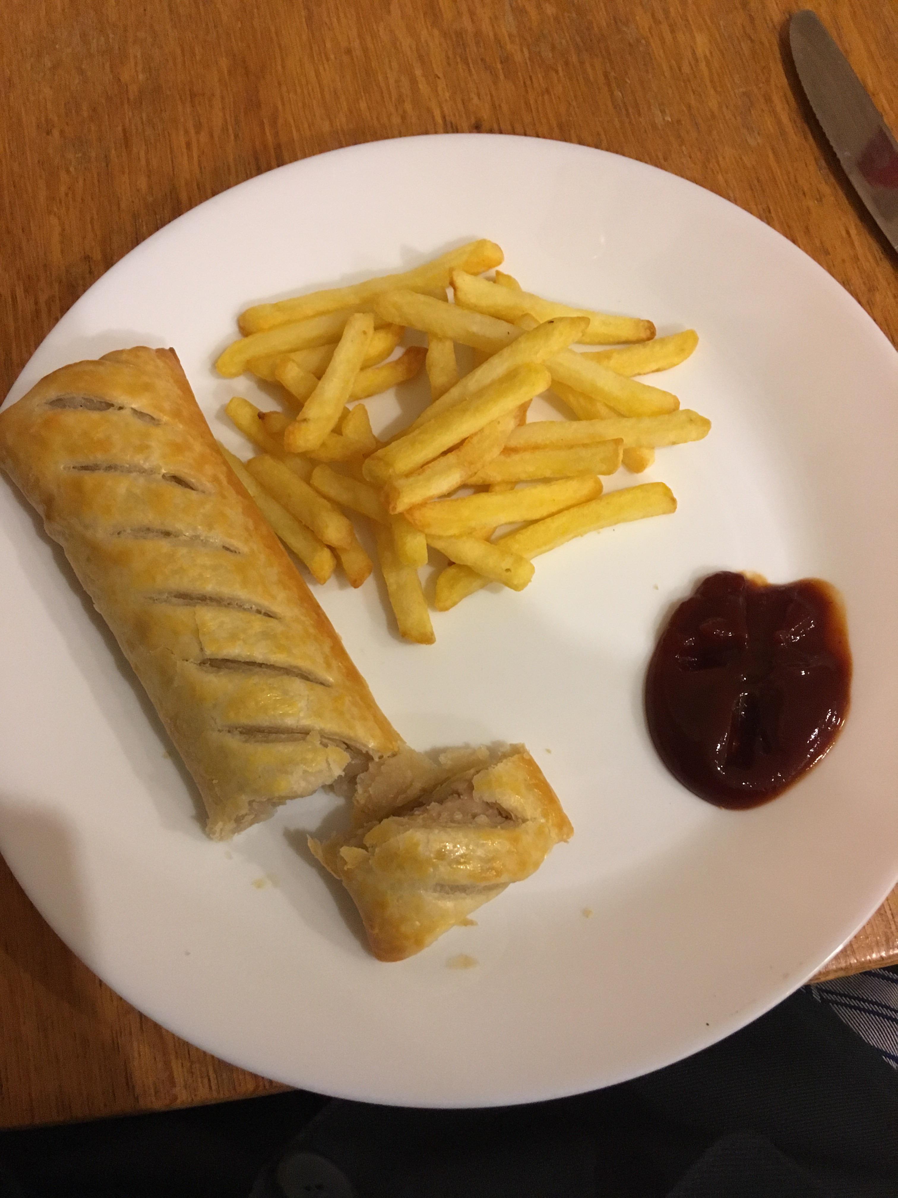Nice endofweek meal Greggs sausage roll with oven chips and barbeque