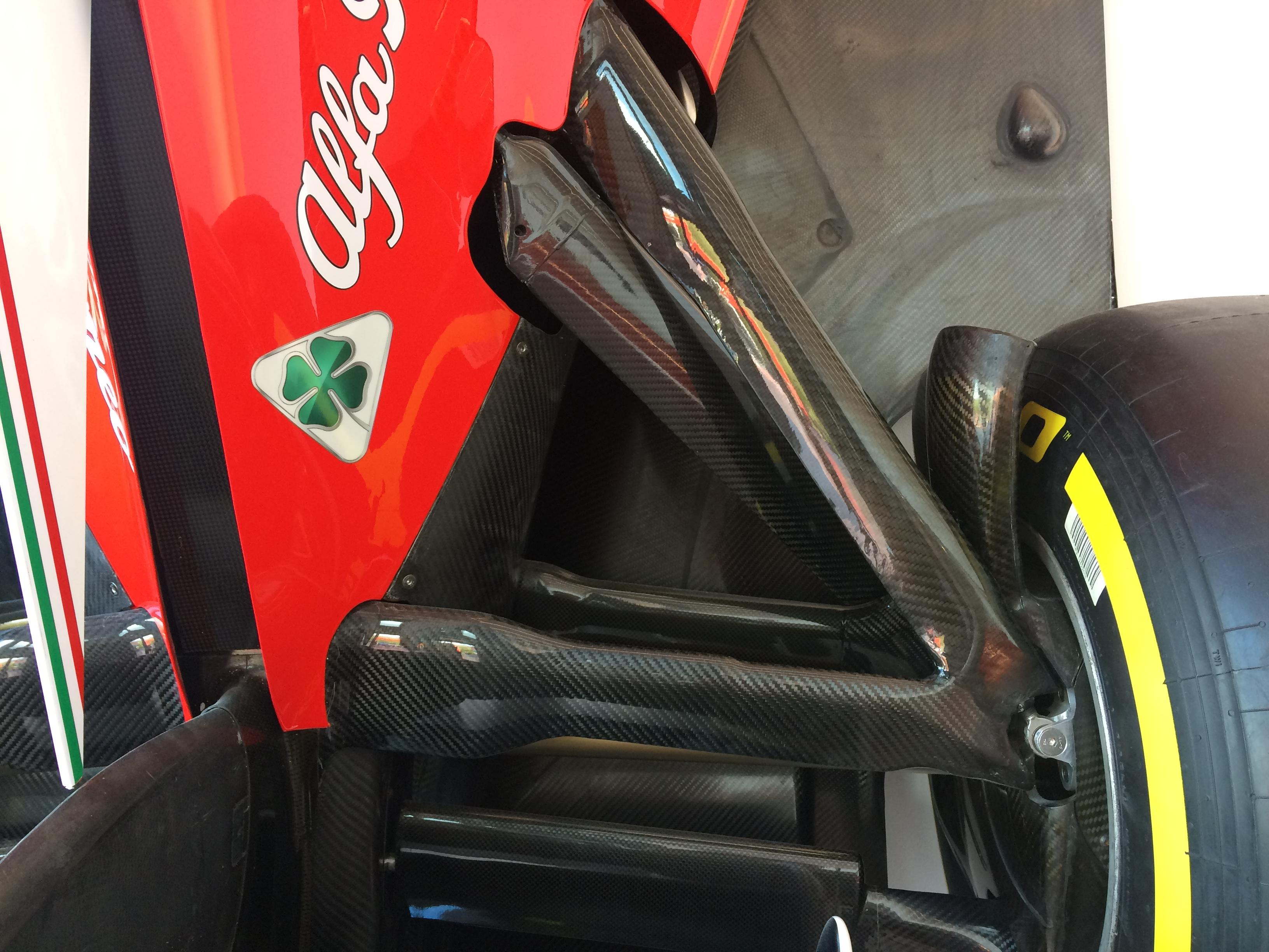 how are these carbon fiber suspension arms shaped and designed? r