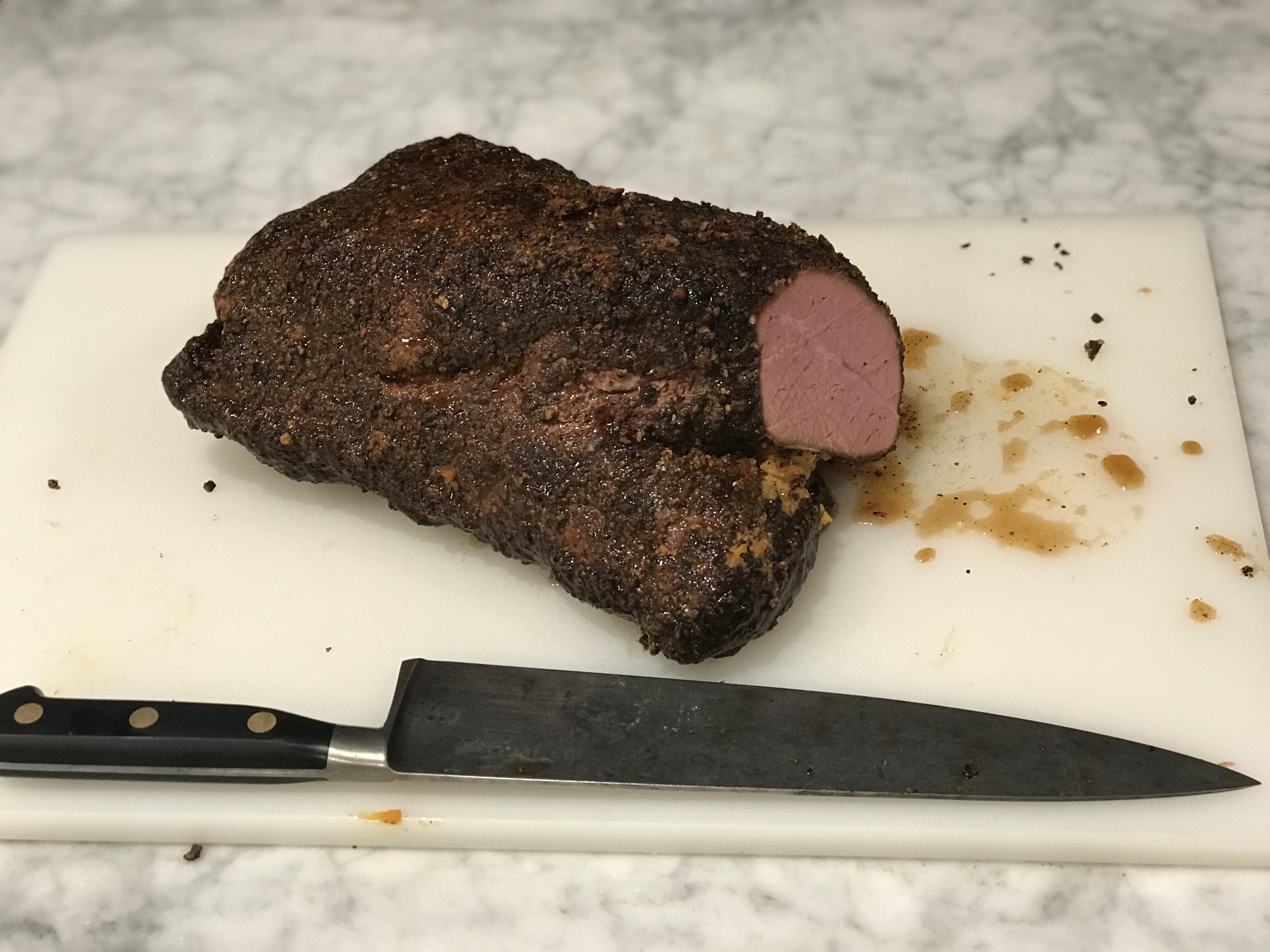 First pastrami 6 hours on a WSM with cherry and finished with a sous