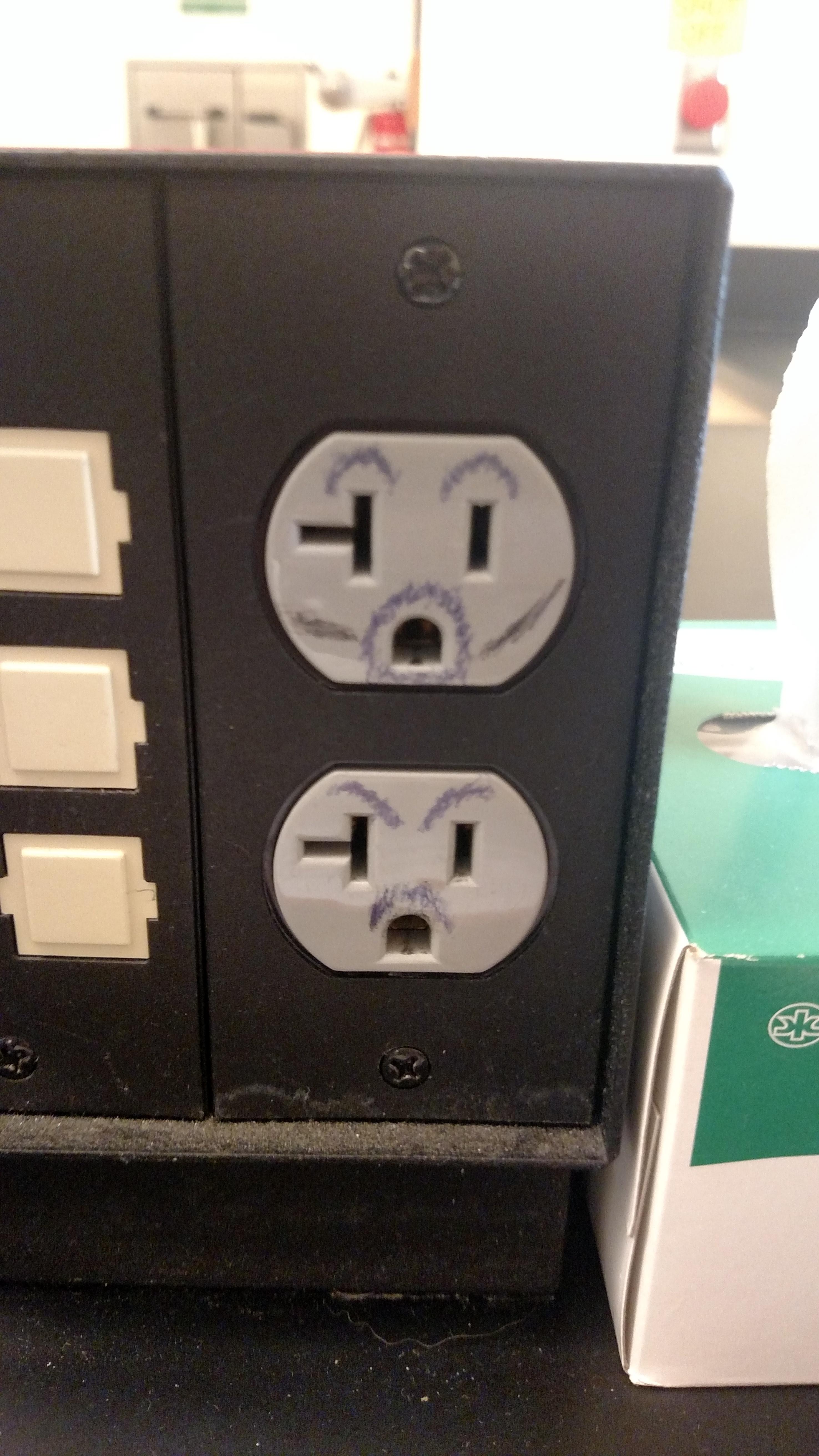 Someone drew faces on these outlets r/mildlyinteresting