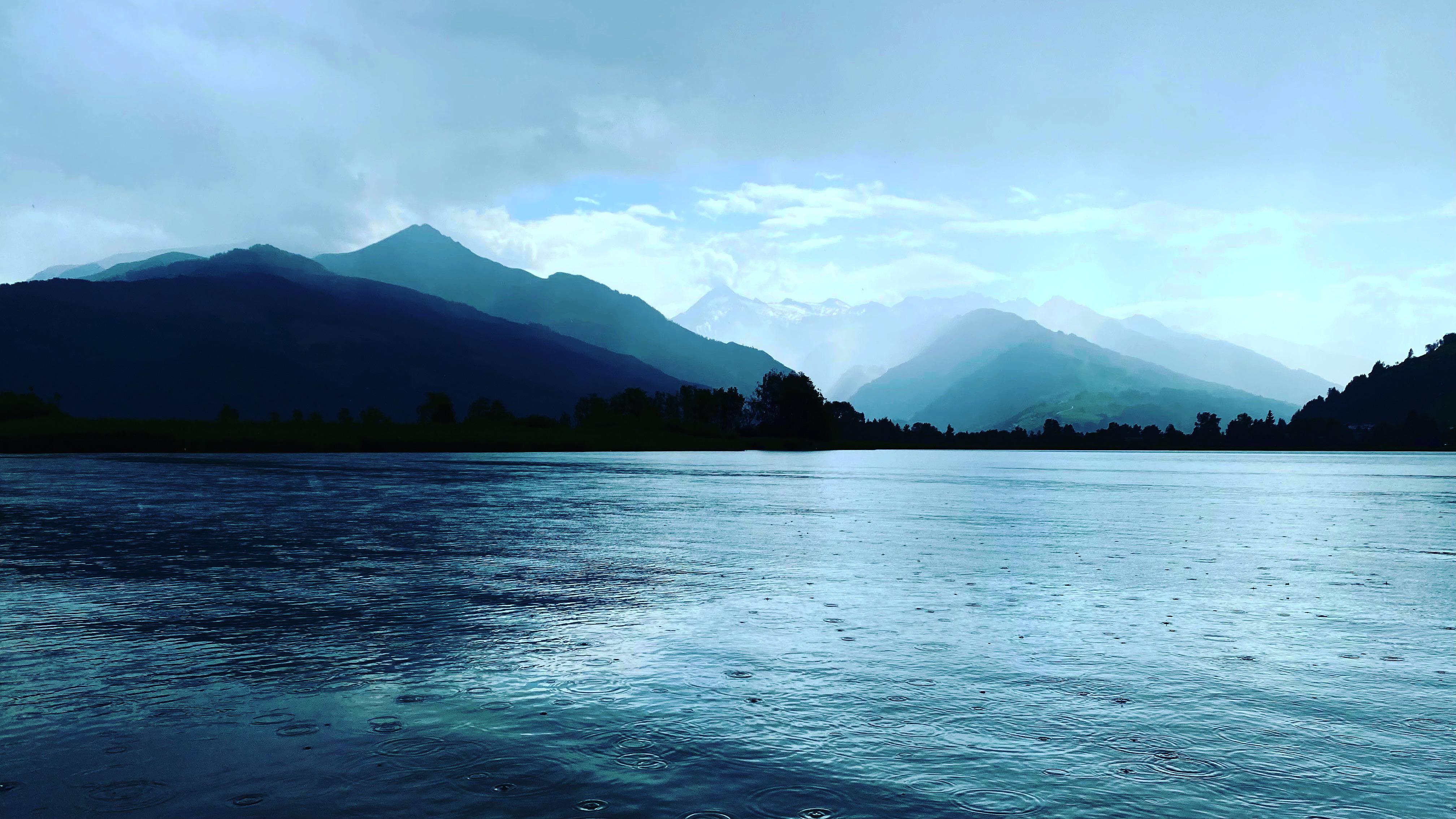 Canoeing on a rainy day. Zell am See Austria r/Outdoors