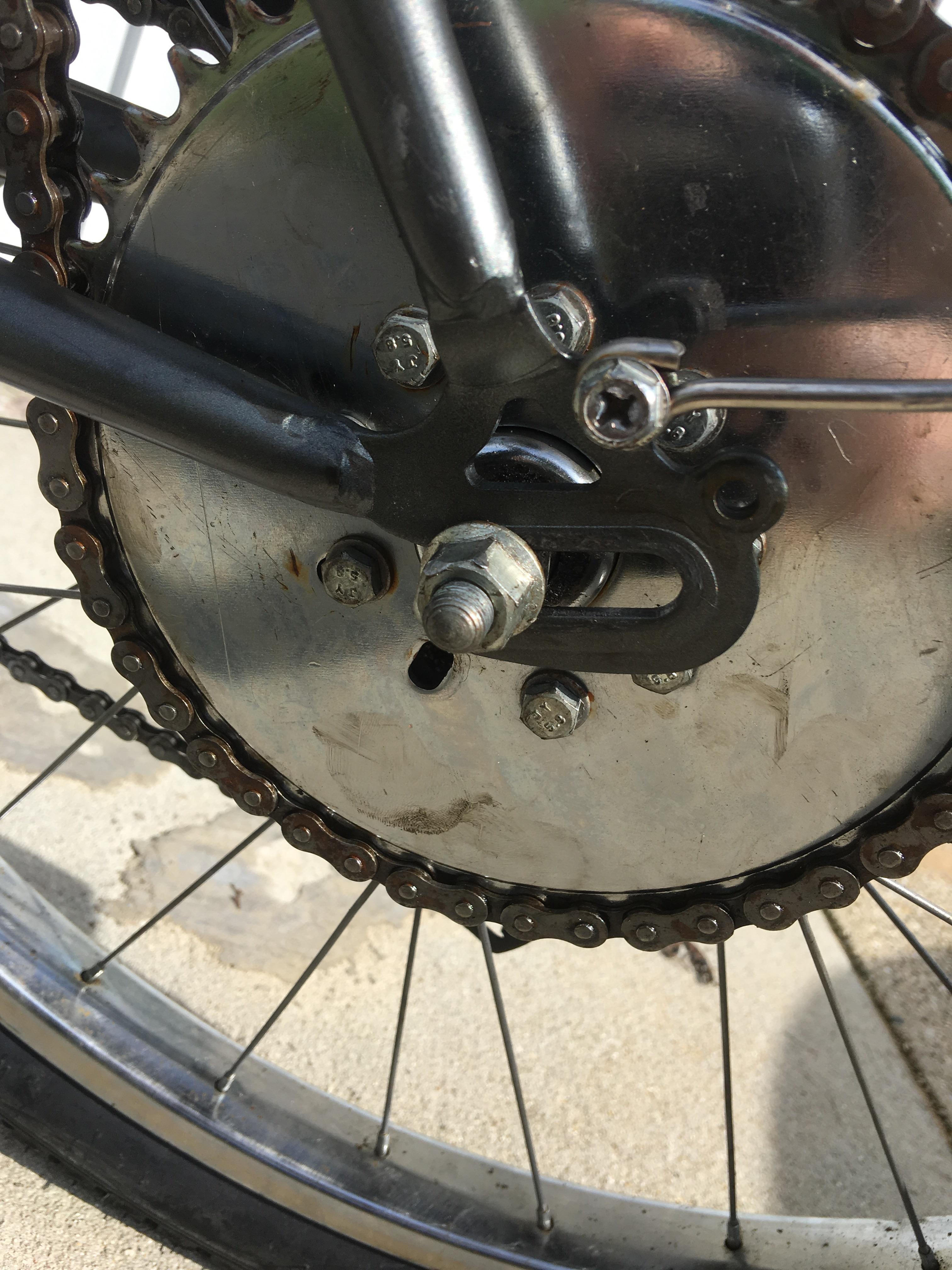 I can’t stop my rear wheel from moving forward from the chain tension