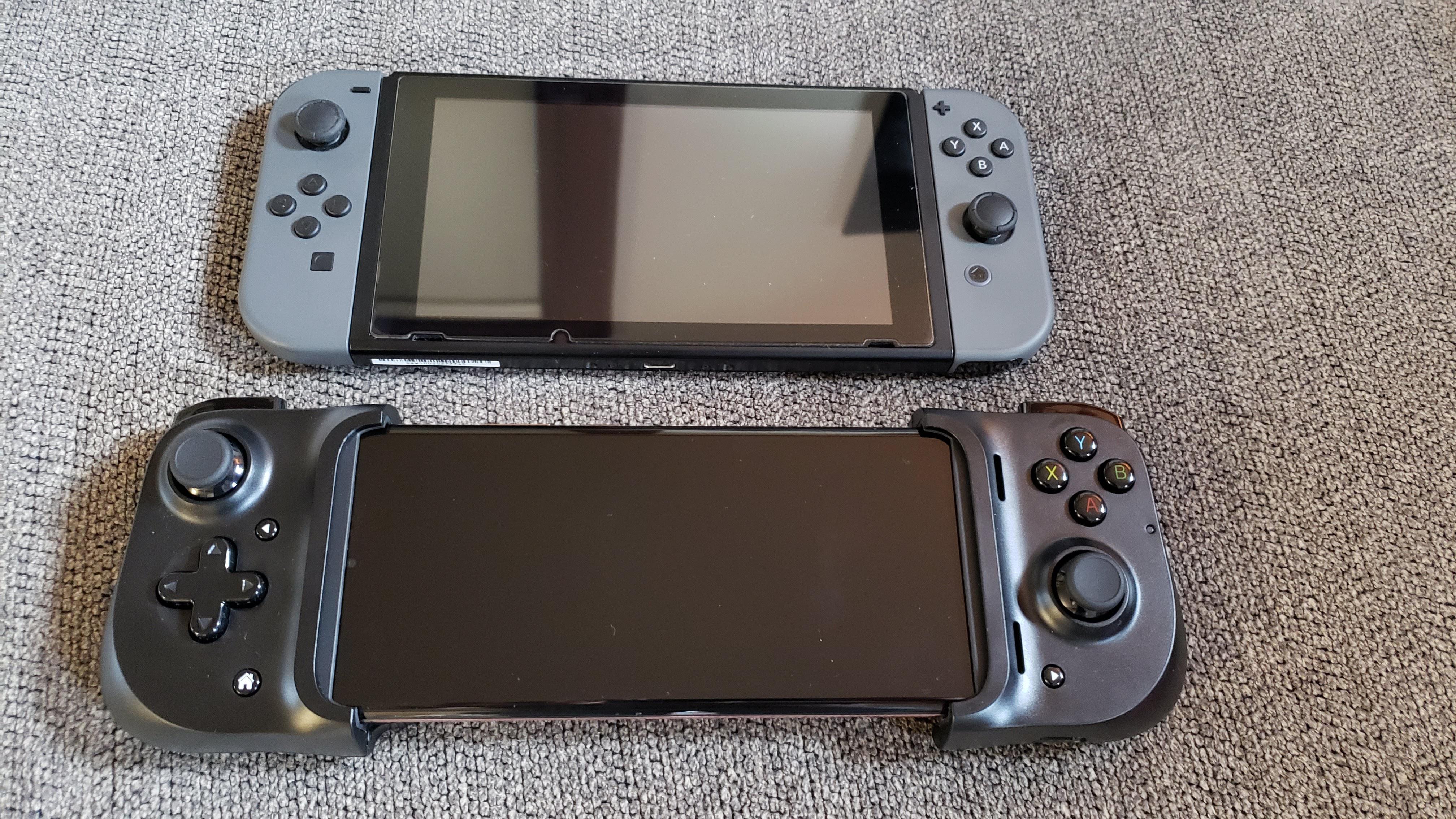 Note 20 ultra with razer kishi. Nintendo switch for scale