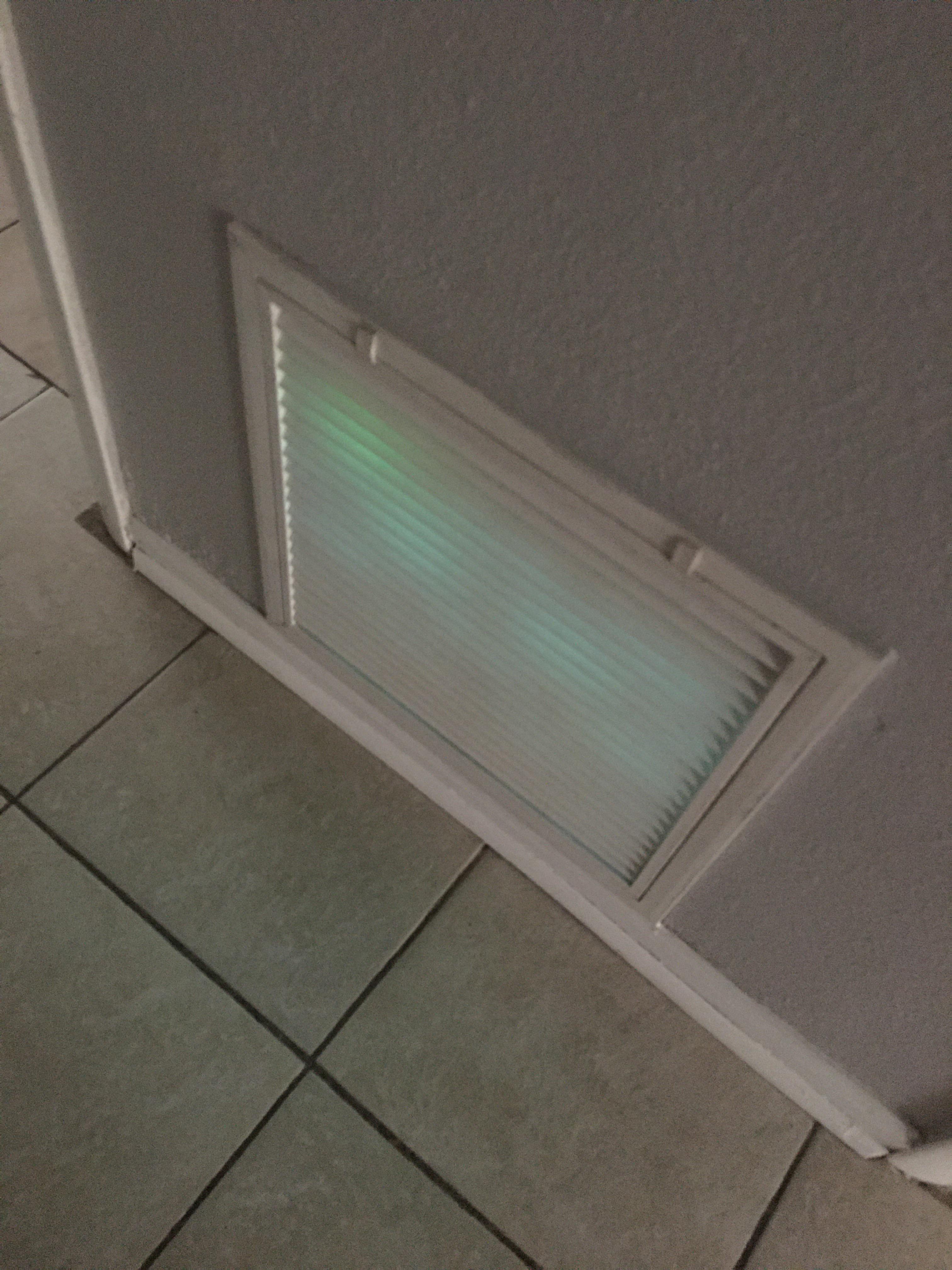 staying at an air b&b, why does the vent have a green light inside it