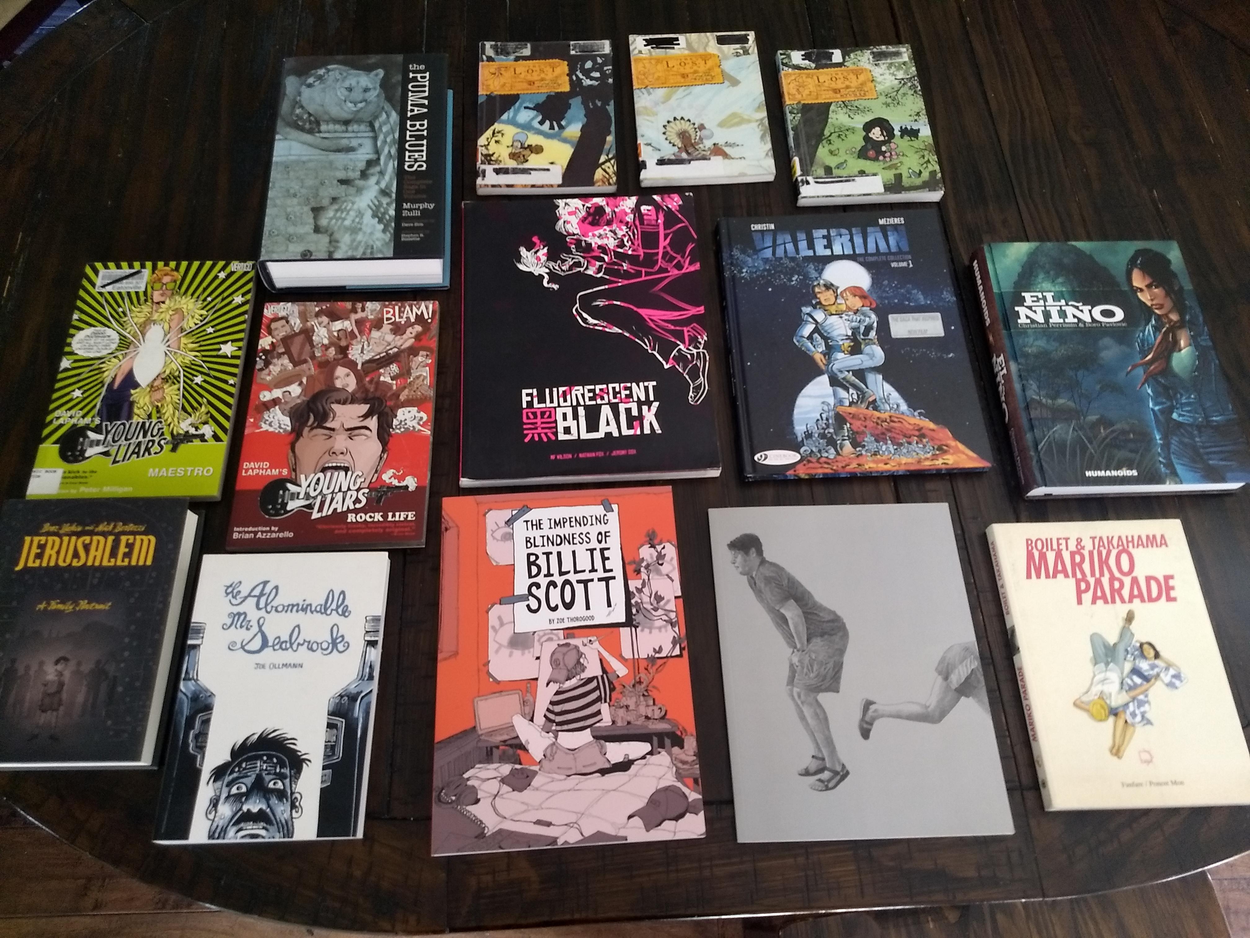 Out of roughly 2000 graphic novels on my shelves, these are the 14 unreads that haunt me. r