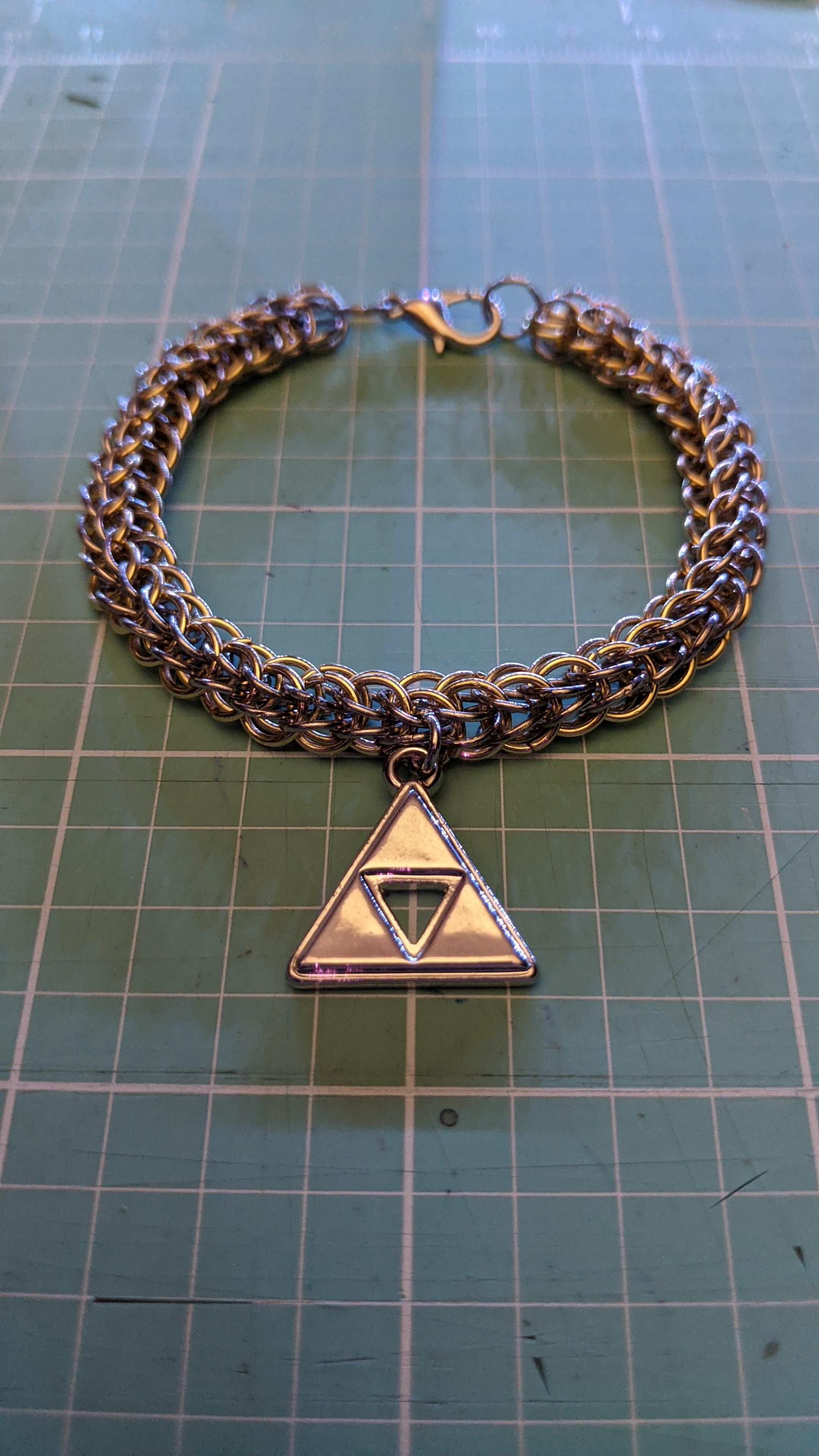 [ALL] My first chainmail bracelet! I decided to add a Triforce charm to