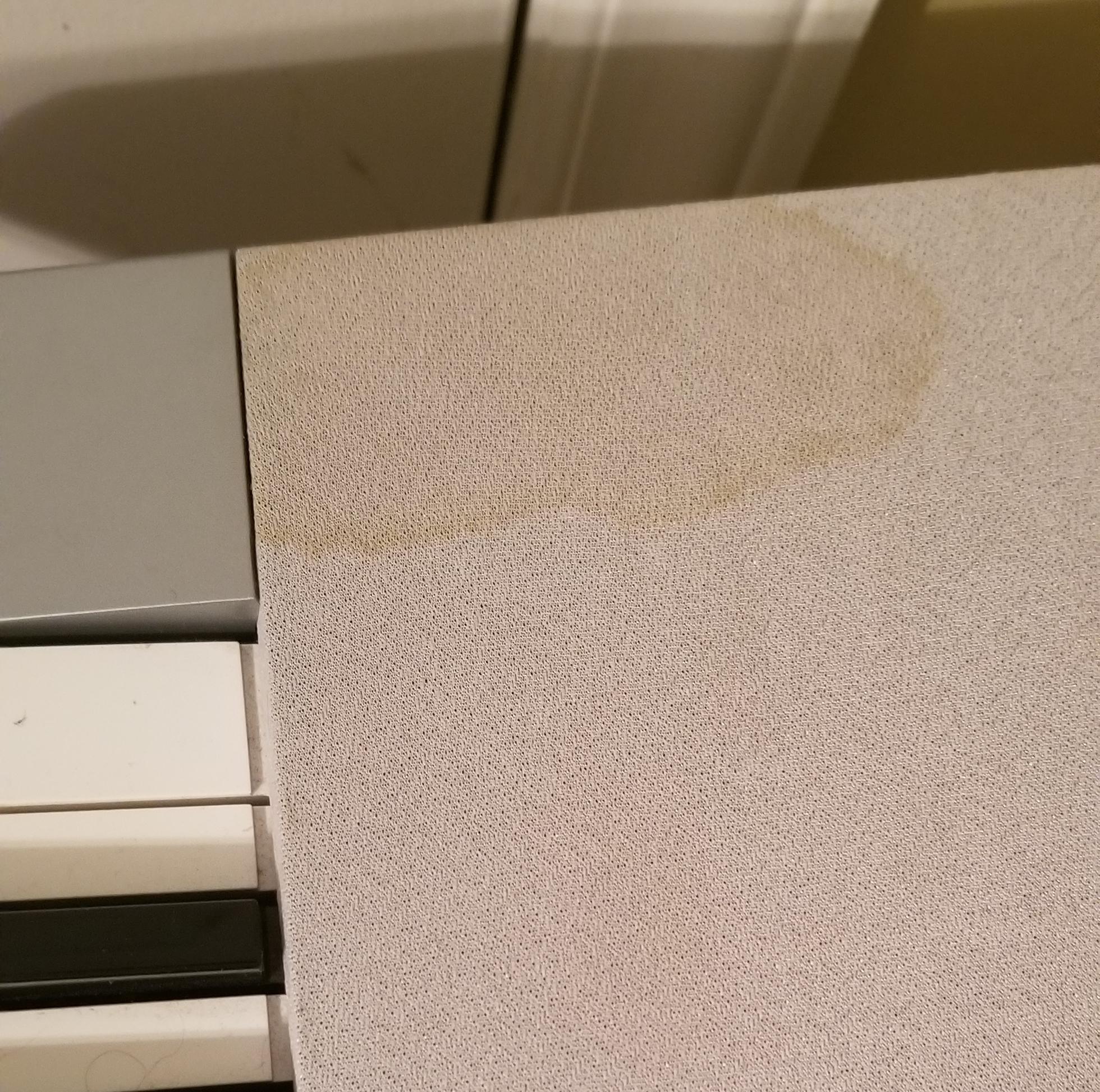 How do I get rid of this mystery stain on my keyboard's clothlike