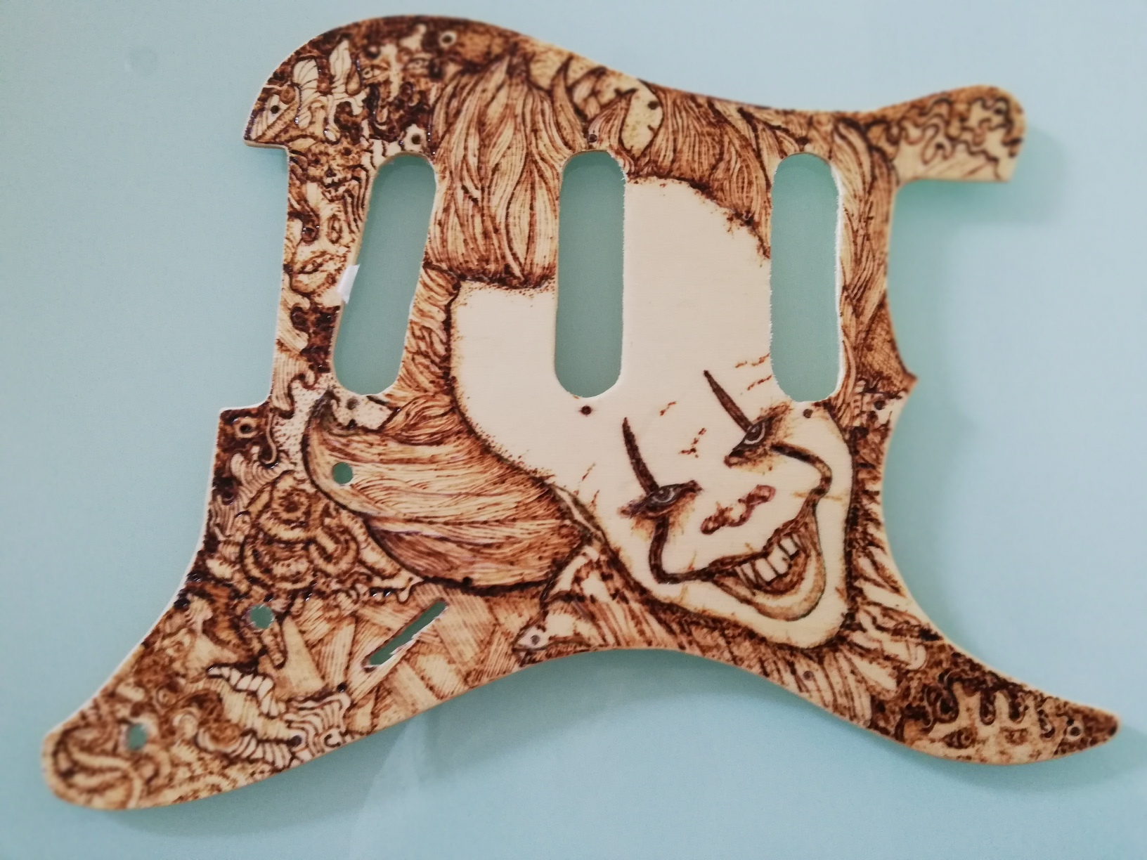 Custom handmade pickguard. Pirography on wood, stratocaster pickguard