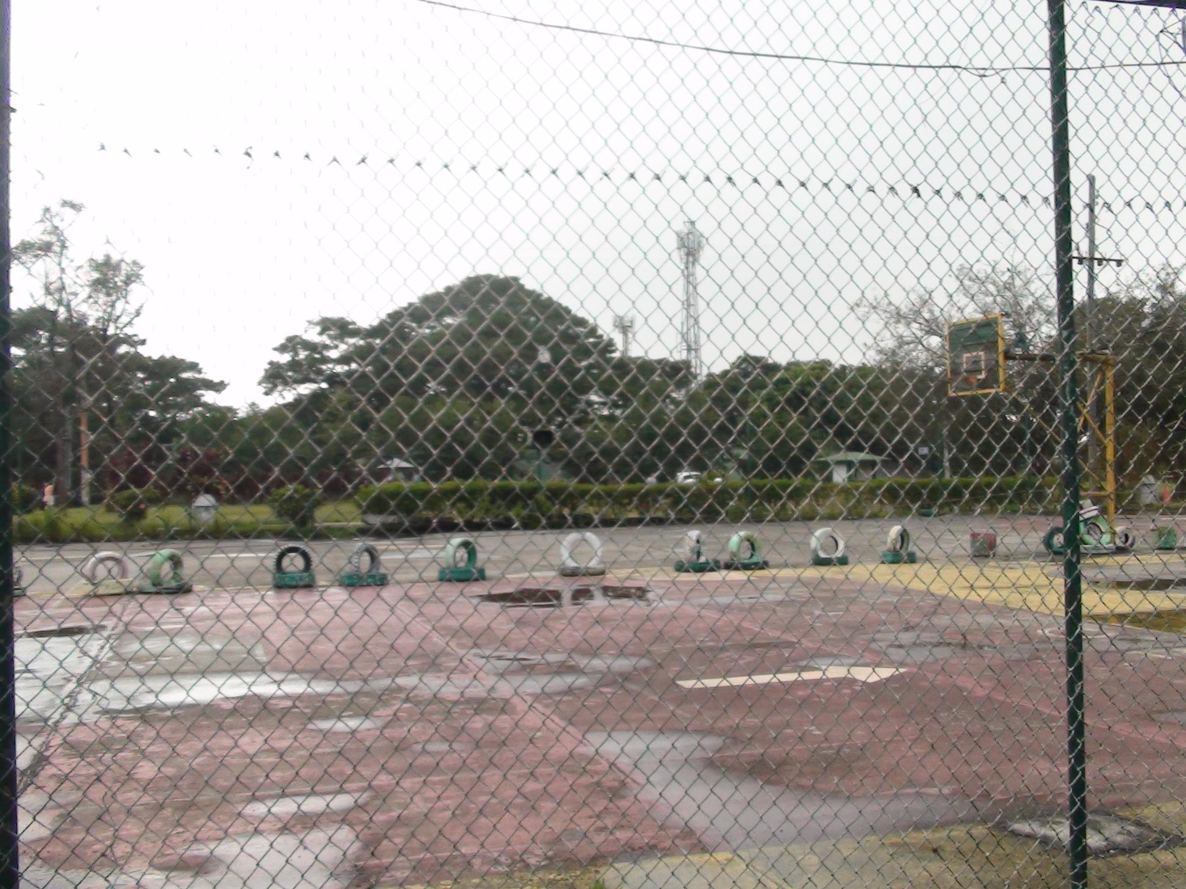 Taken on a camcorder at a playground/basketball court r/LiminalSpace