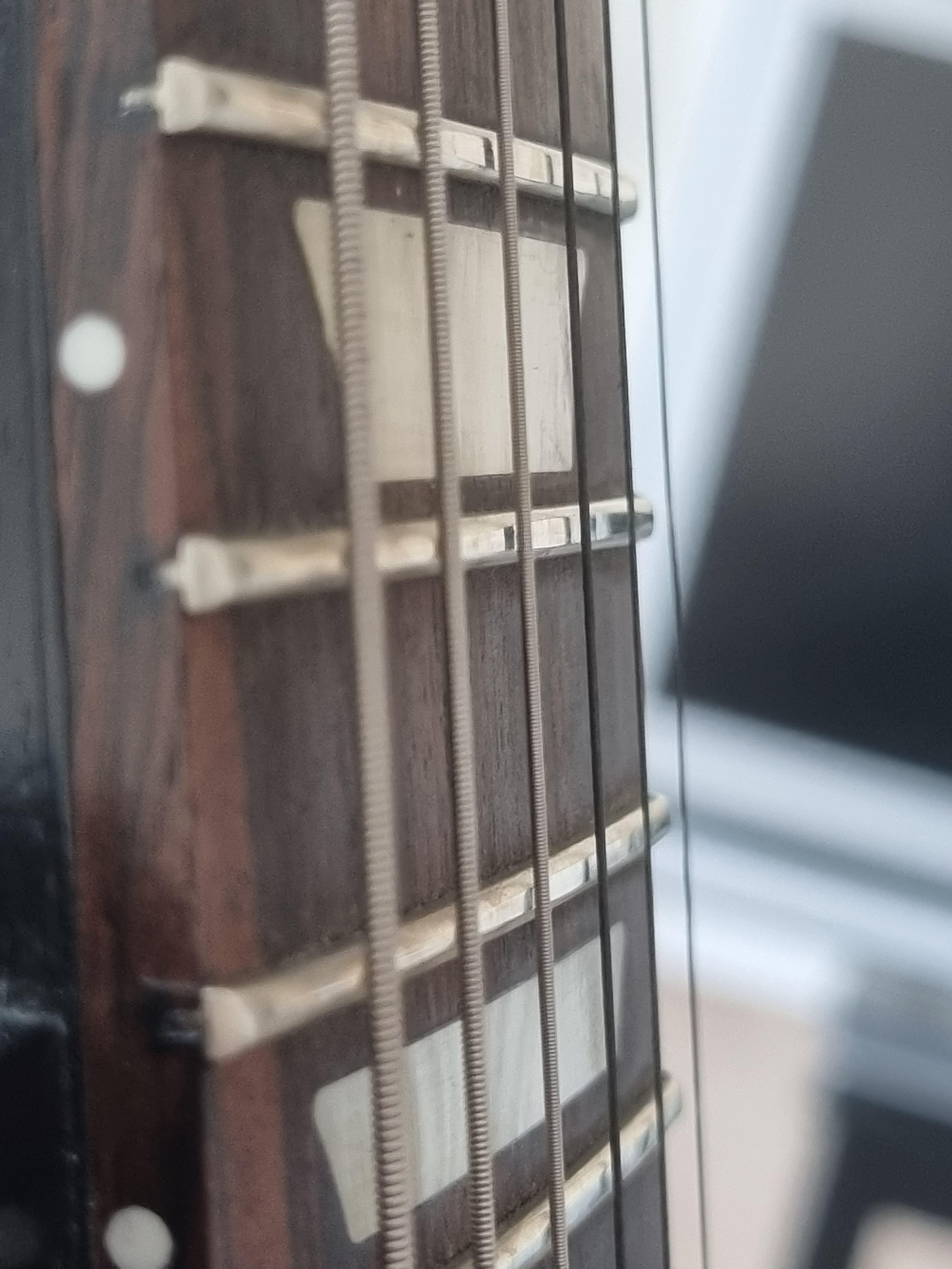 Flat spots on frets causing a bit of fret buzz. Should I risk trying to