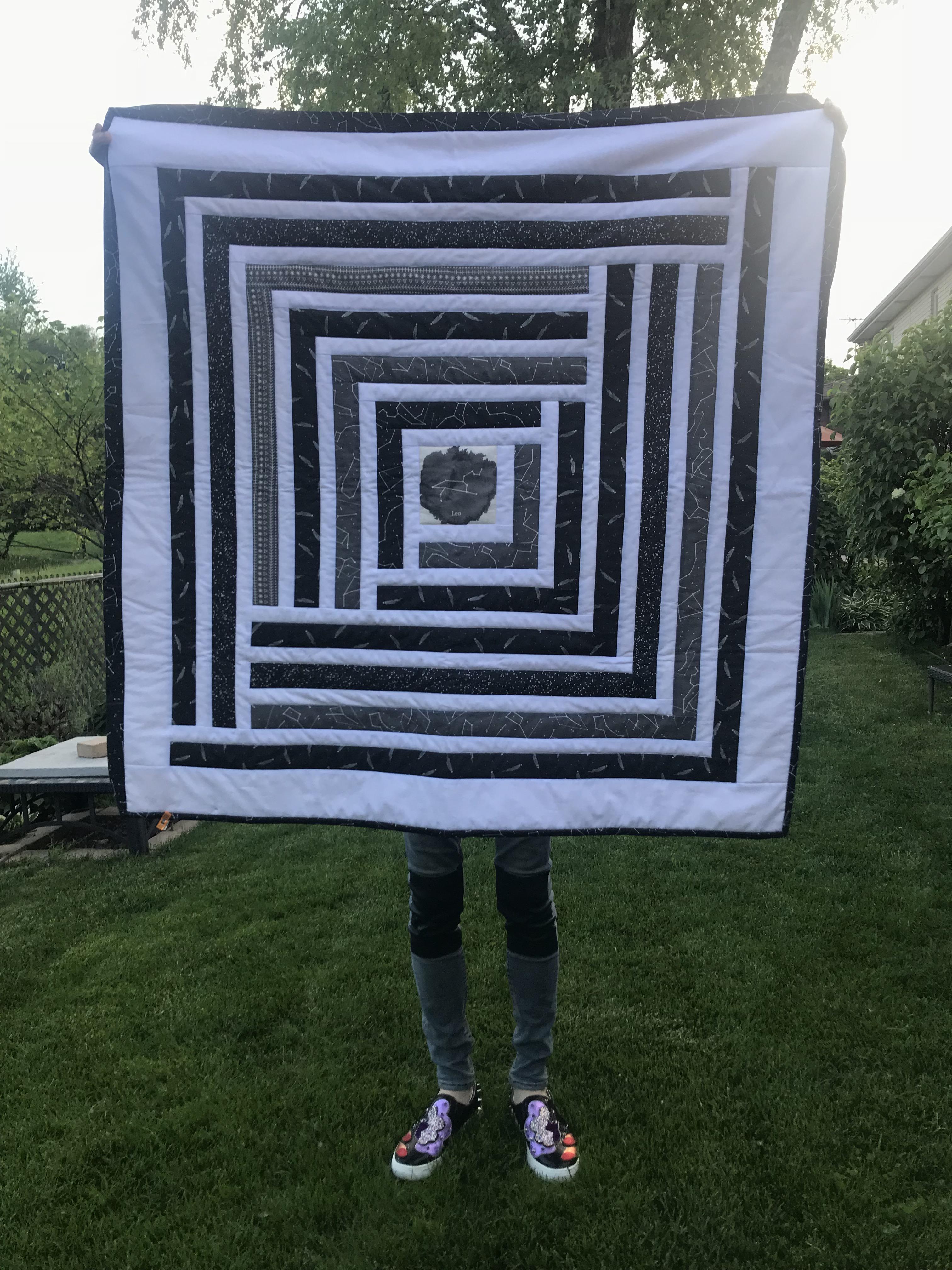 Almost done with this baby quilt! Campfire Quilt by SuzyQuilts, fabric