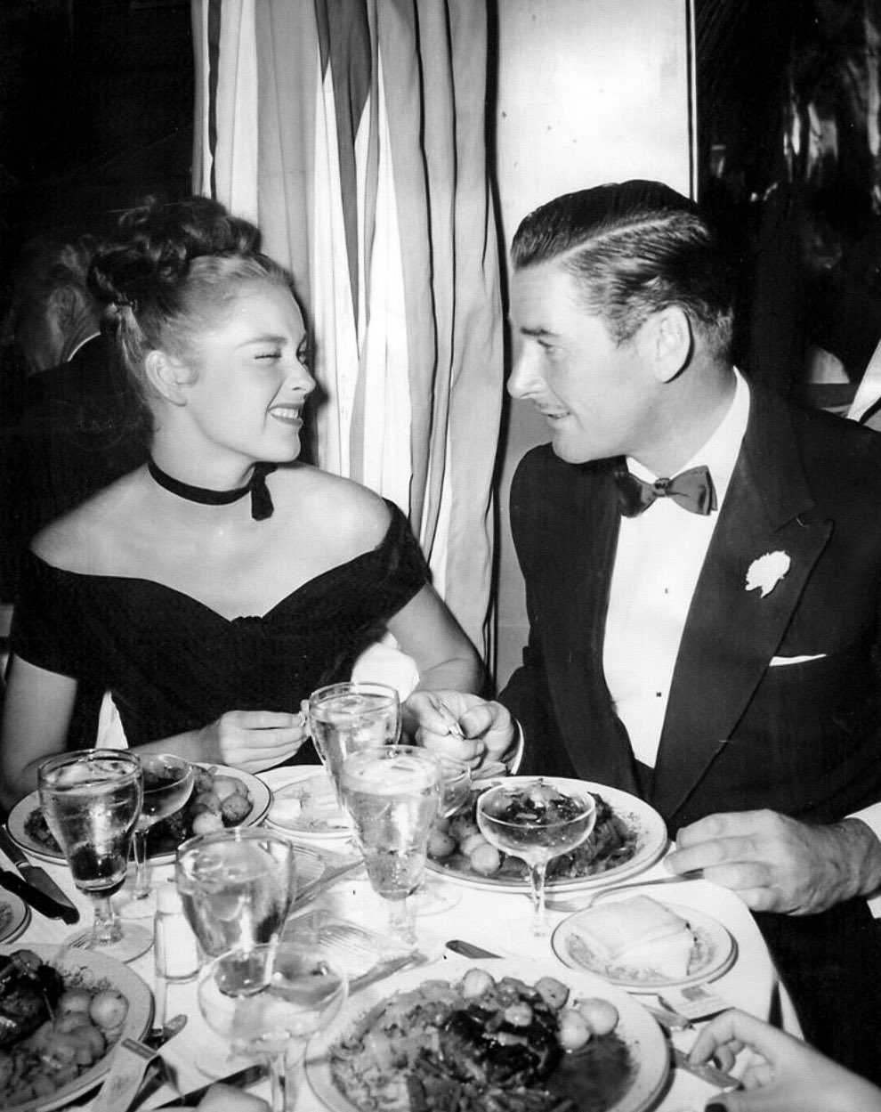 Errol Flynn and his wife Nora Eddington at the Mocambo in