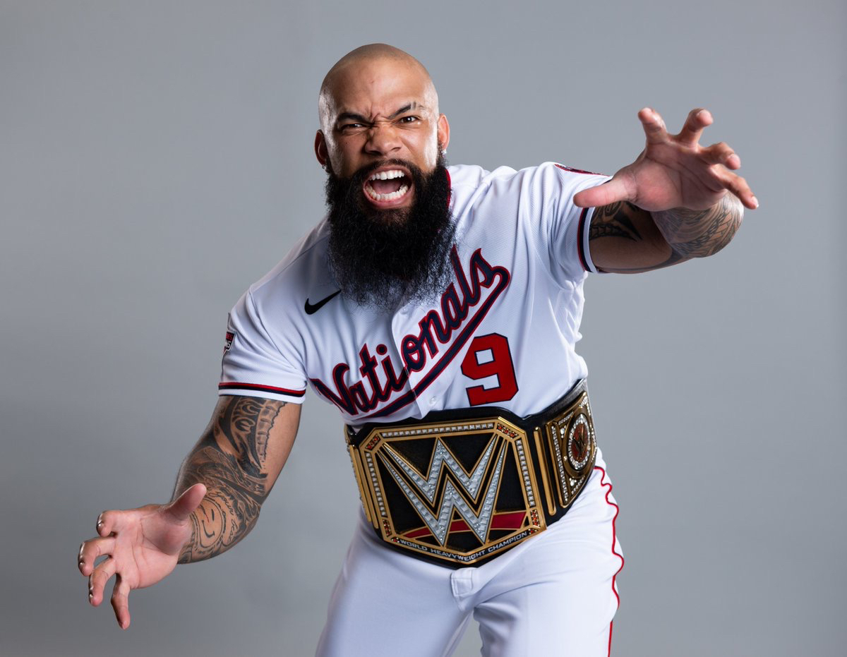Washington Nationals Eric Thames poses for MLB picture day with WWE