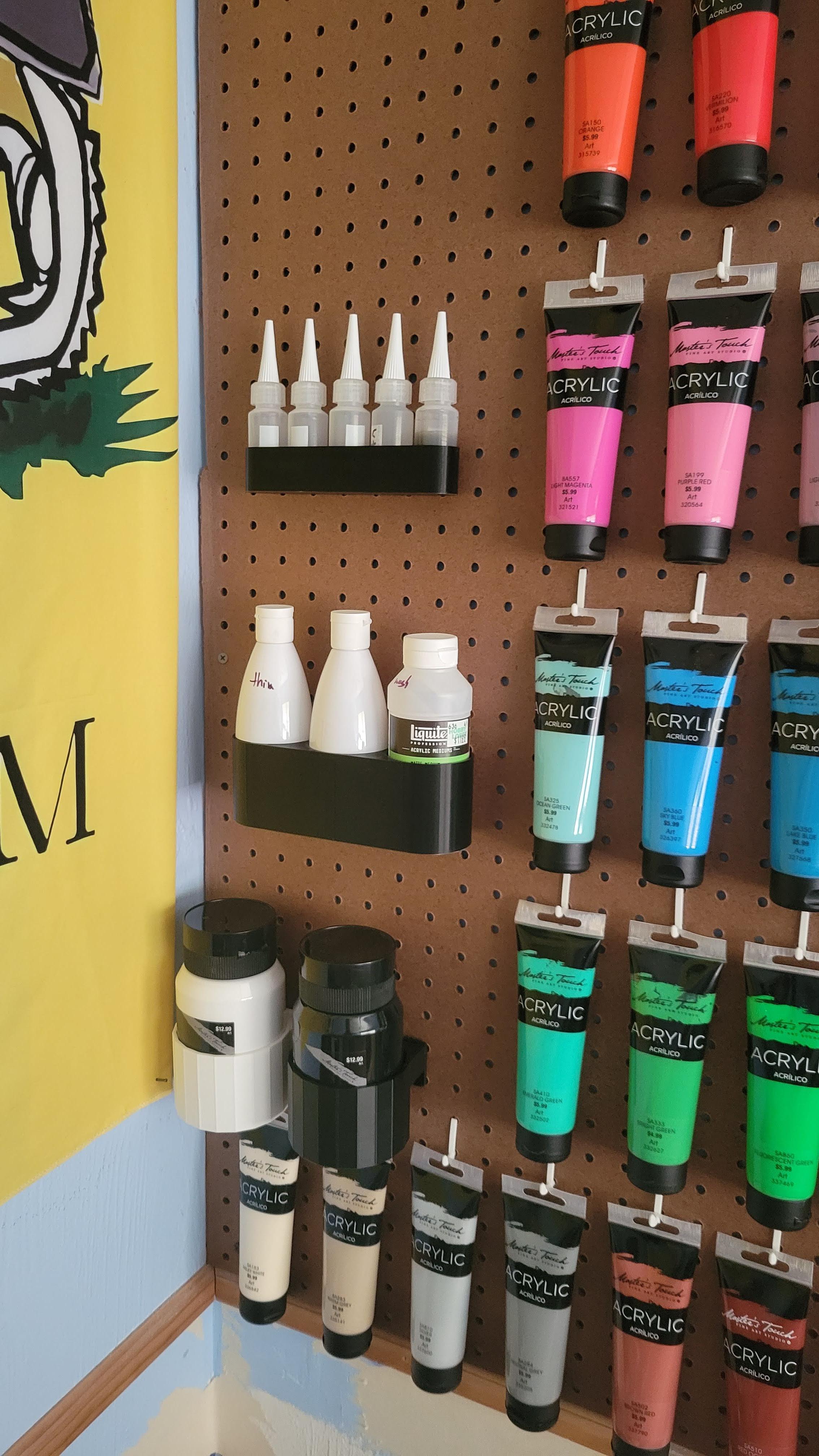 Pegboard bottle holders. link in comments. stl and step for the pegs included if you want to