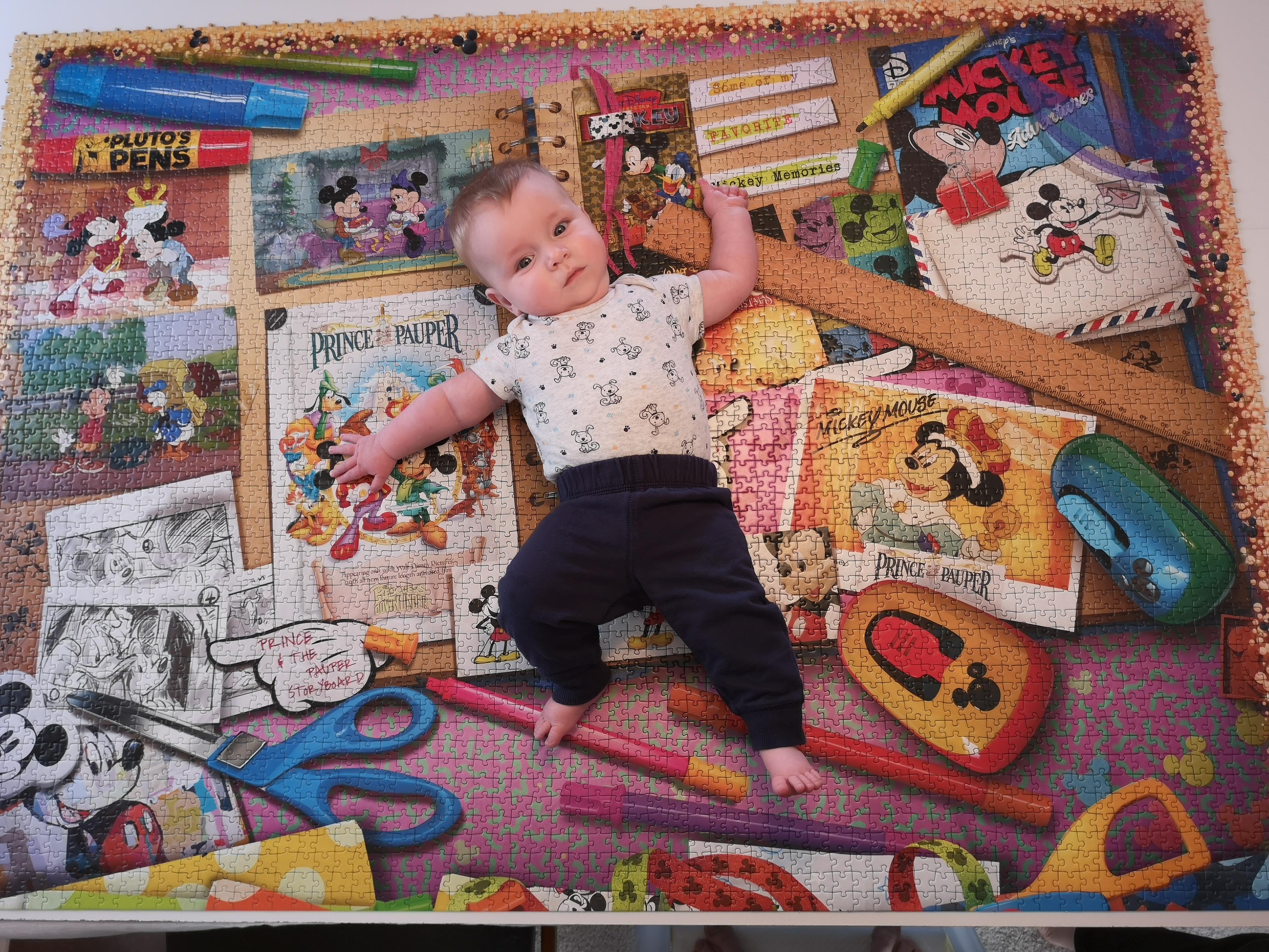 Section 4 complete of our 40000 piece Disney puzzle! Baby for scale