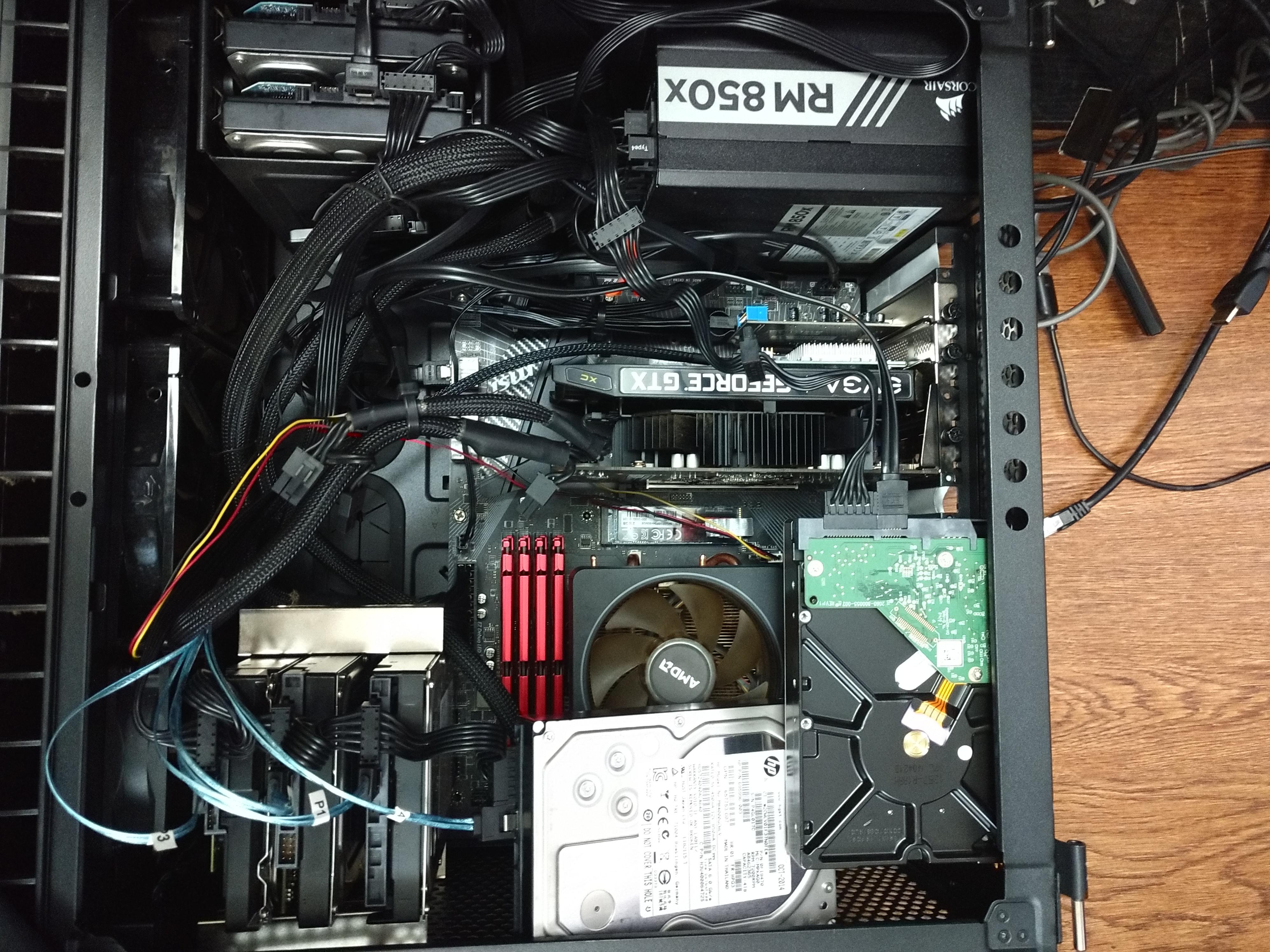 Seven 3.5 hard drives in a mid tower. r/unRAID