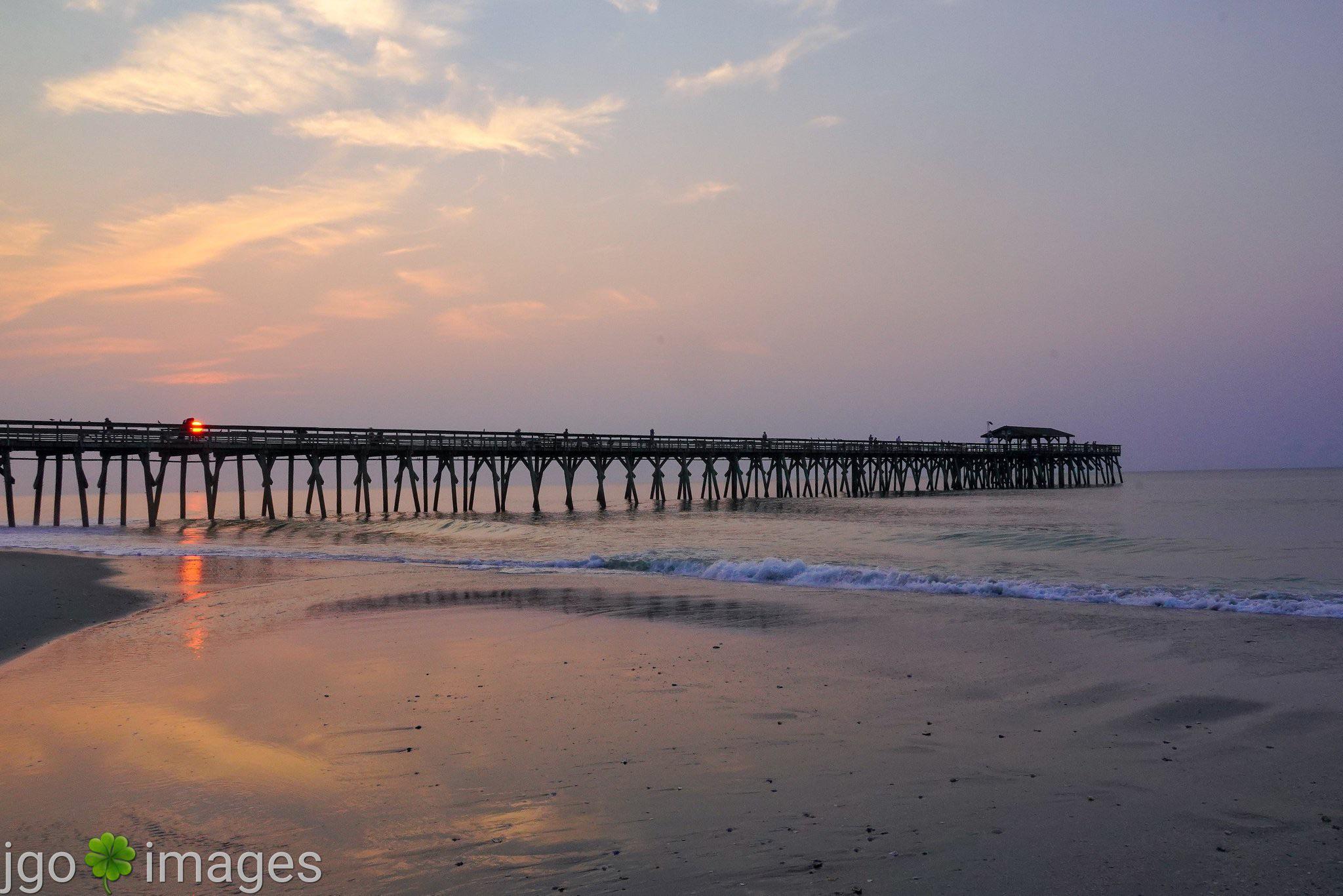 Sunrise over the pier at Myrtle Beach State Park this morning 😊 r