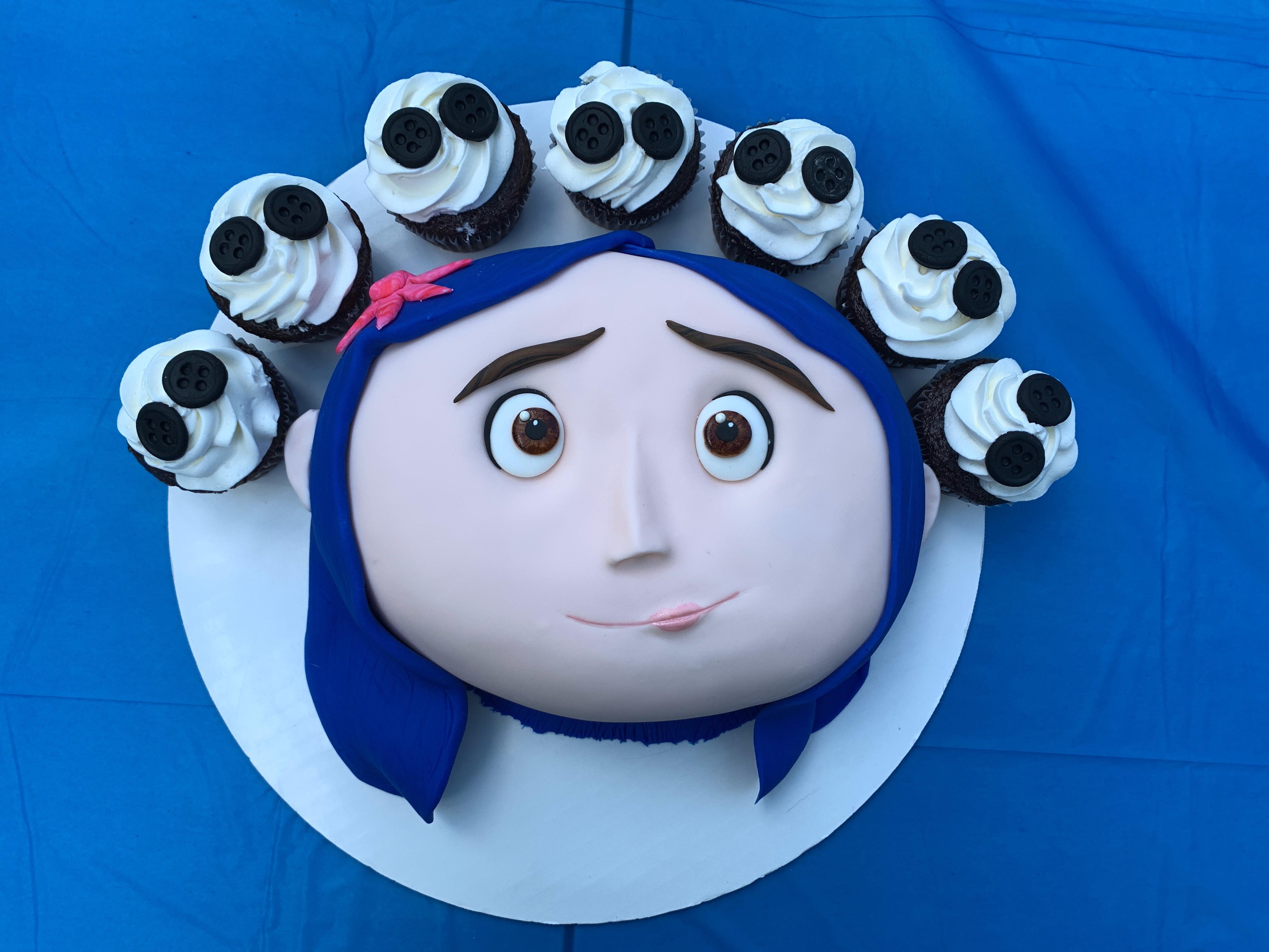 My daughters 10th birthday cake featuring Coraline! Complete with