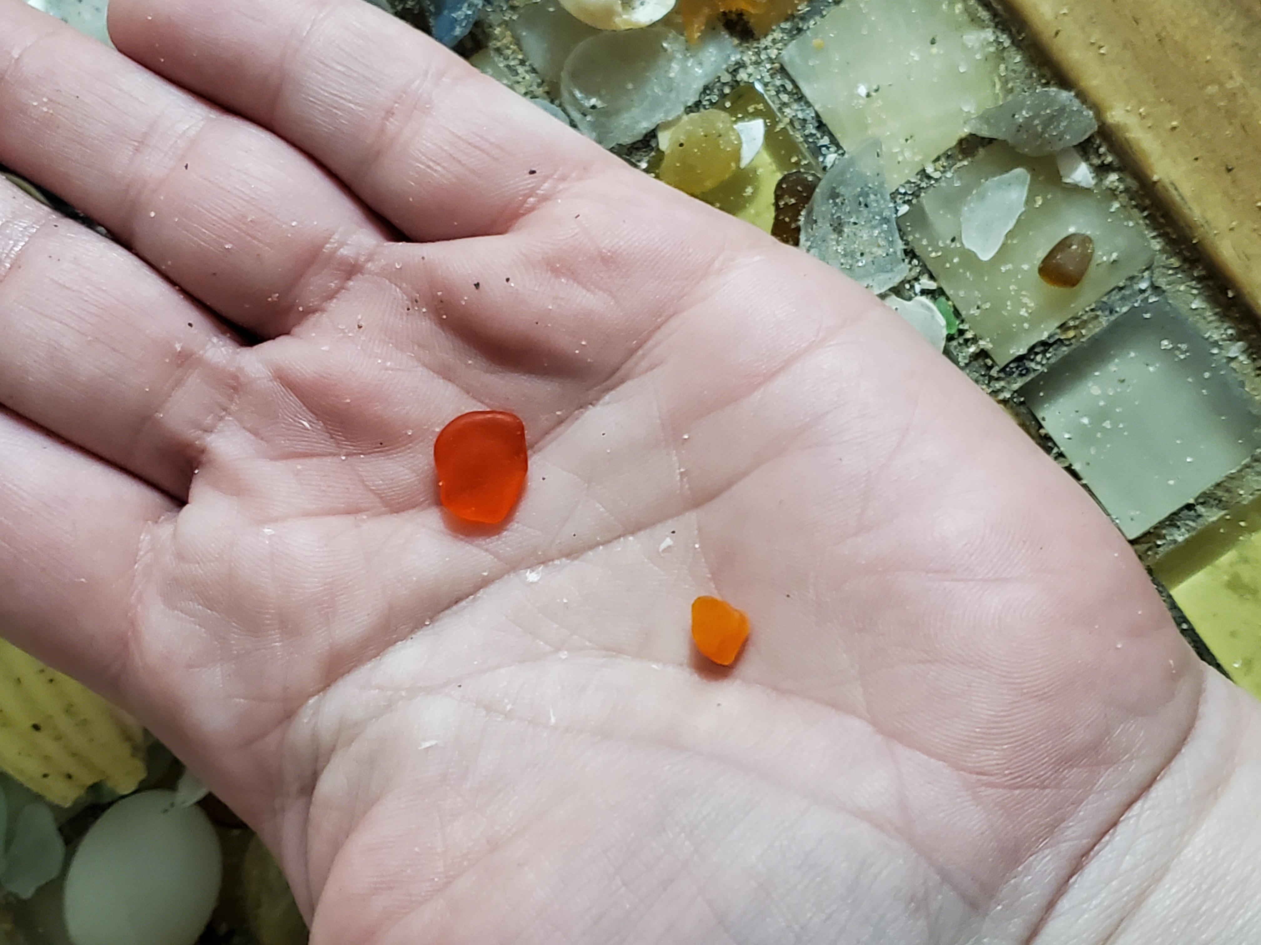 Found 2 pieces of orange sea glass today that were each a different