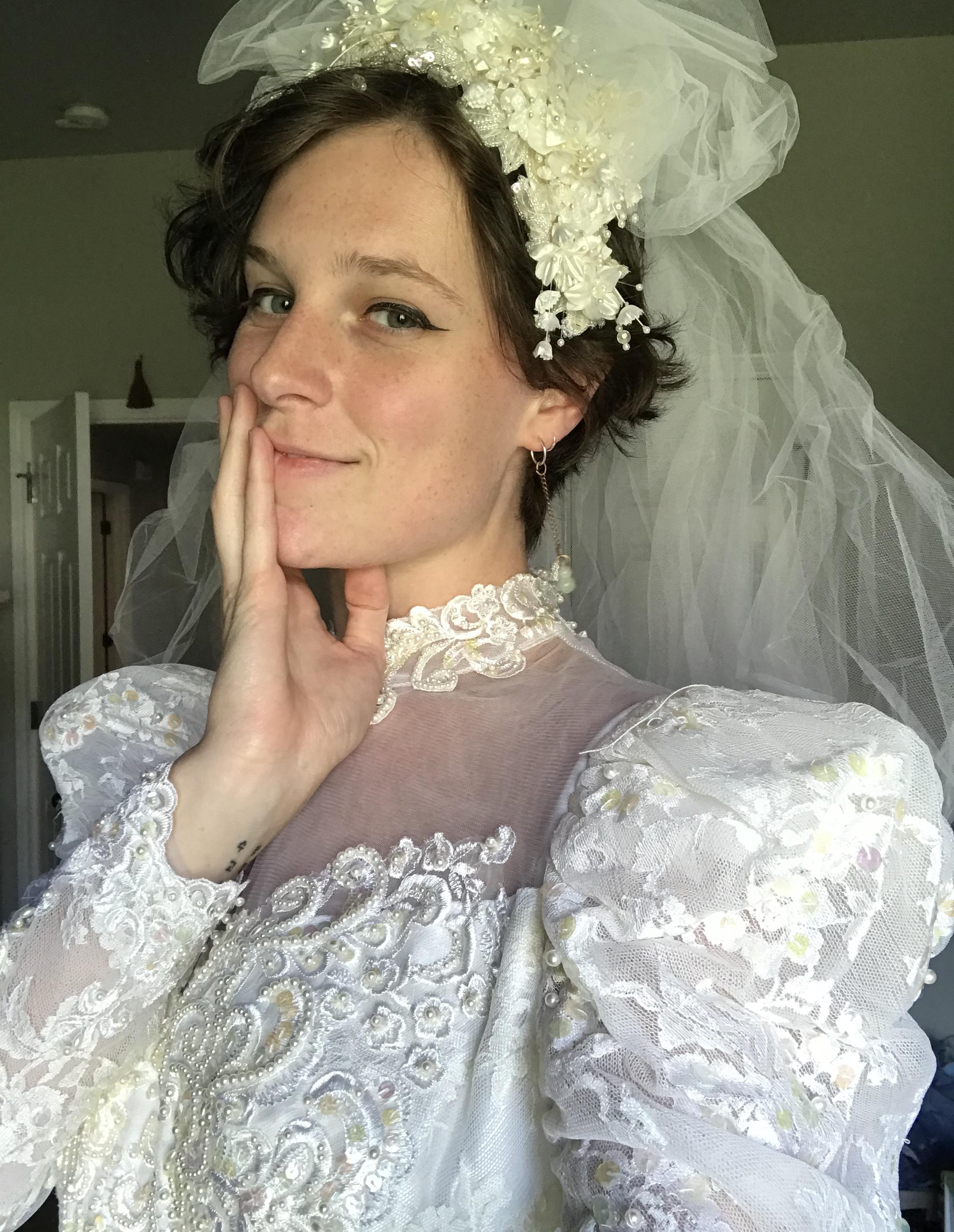 Found my mom’s old wedding dress r/shorthairedhotties